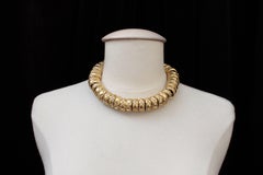1990s, Chanel choker made of quilted gilded metal rings and Swarovski crystals
