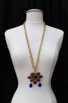 1984, Chanel long gilded metal chain necklace with medallion