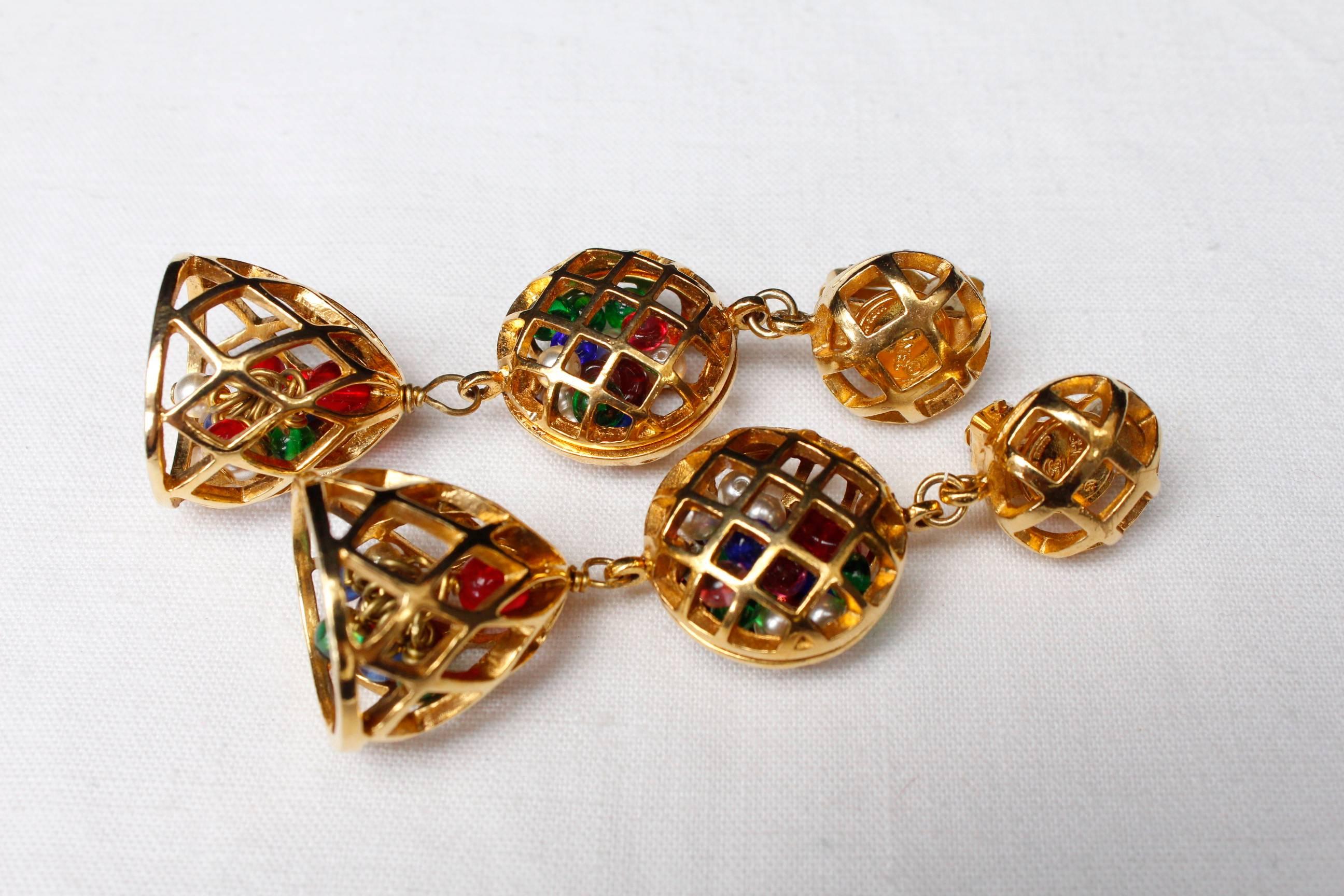 Women's 1980s Chanel clip-on earrings representing gilded metal cages