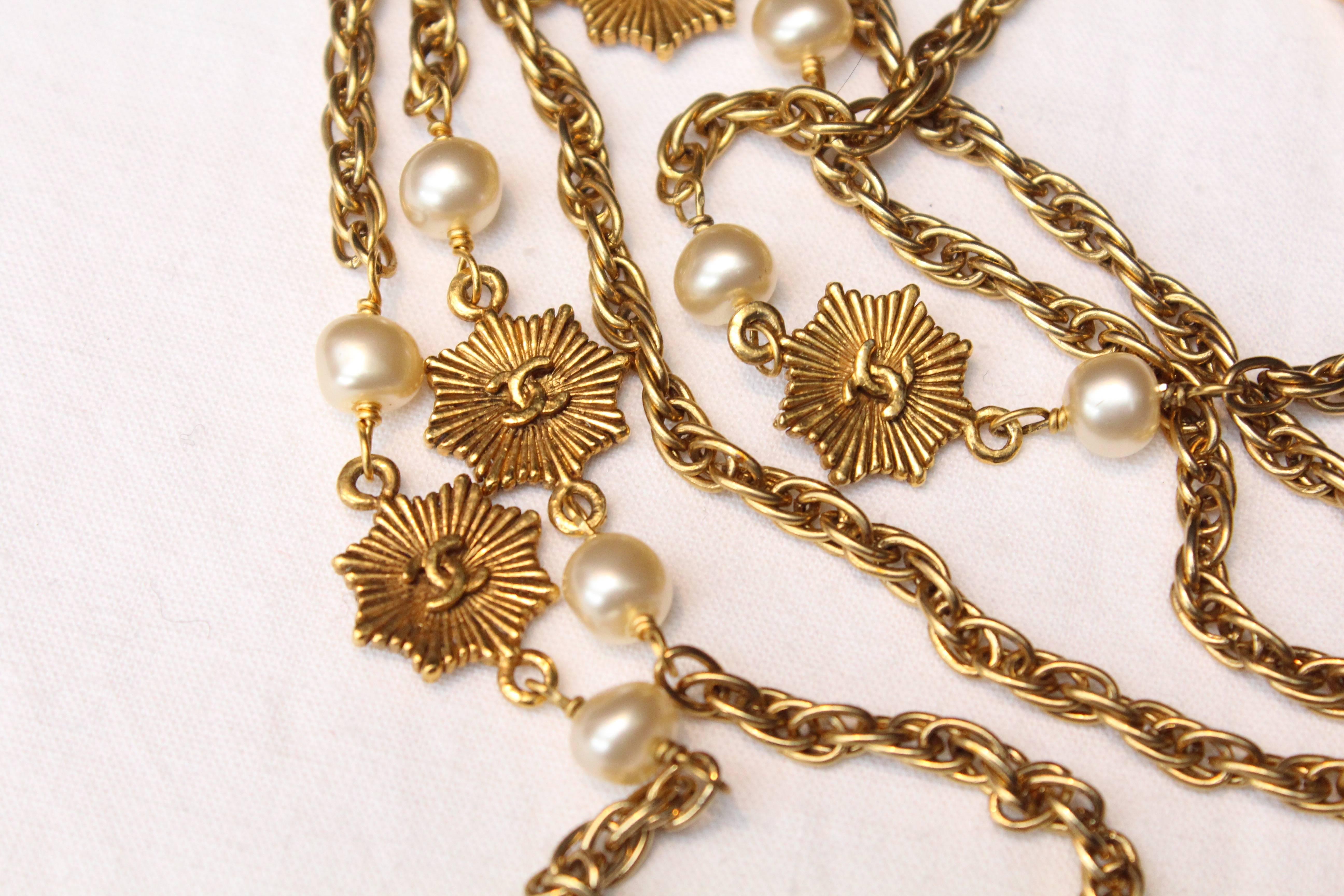 1984 Chanel gilded metal long sautoir with stars and pearly beads 3