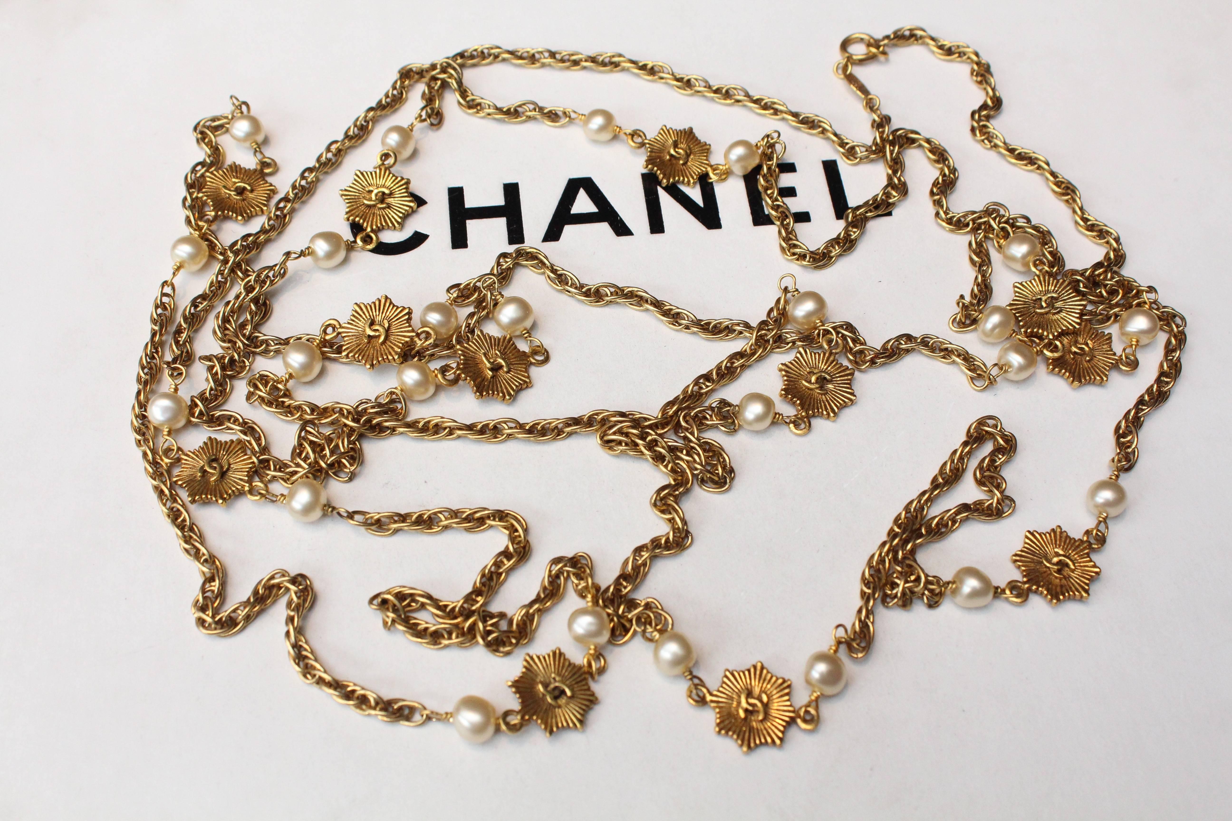 1984 Chanel gilded metal long sautoir with stars and pearly beads 1