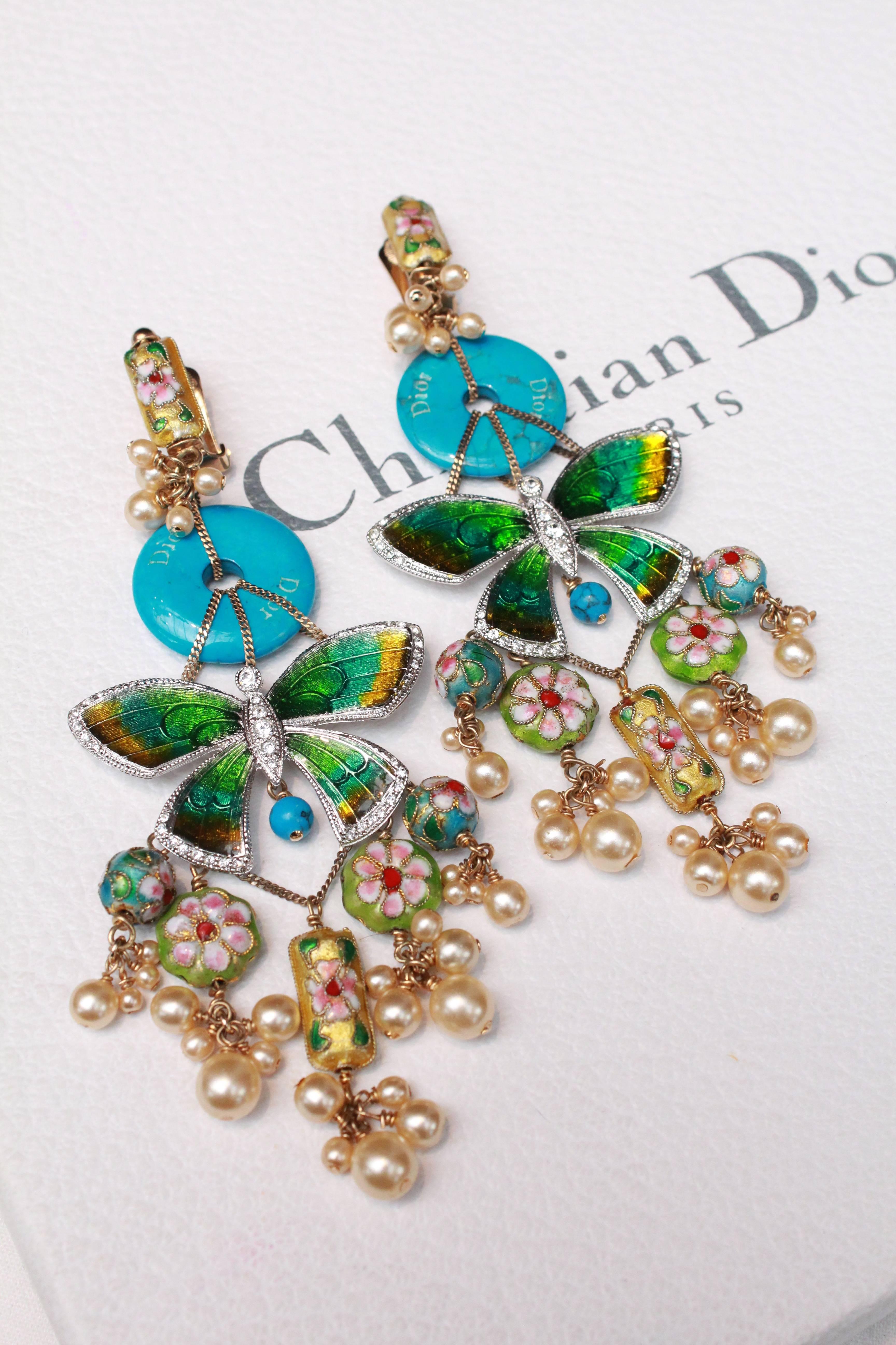 CHRISTIAN DIOR par John Galliano (Made in France) Pair of Asian-inspired drop clip-on earrings. The upper part is made of enamel and represents a flower; below it dangle a bunch of pearly beads, then a turquoise-enameled disc. An enameled  silver