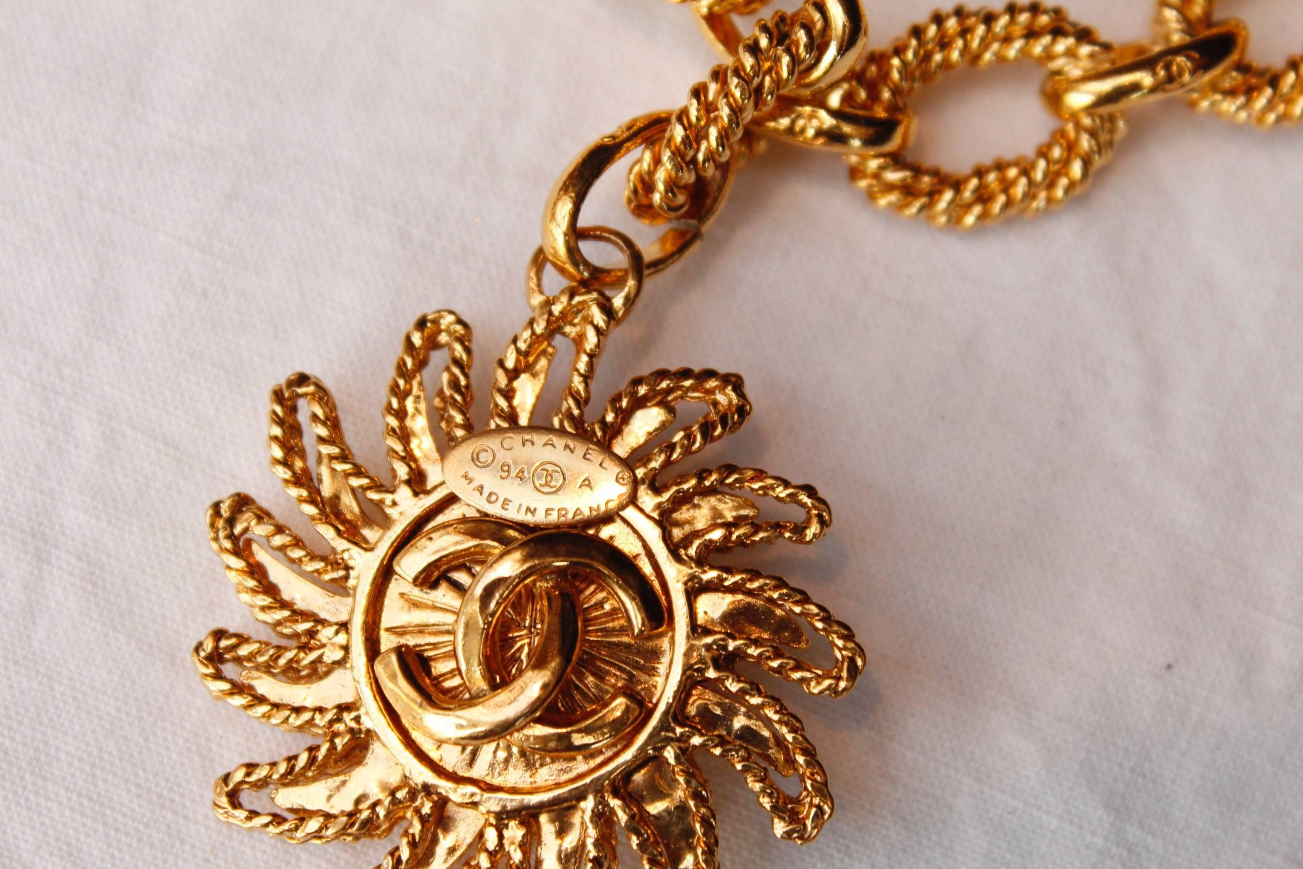 Women's Chanel short gilded metal necklace with sun-shaped pendant, 1994 Fall Collection