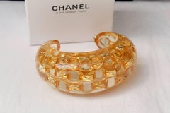 1990s Chanel lucite and gilded metal bangle