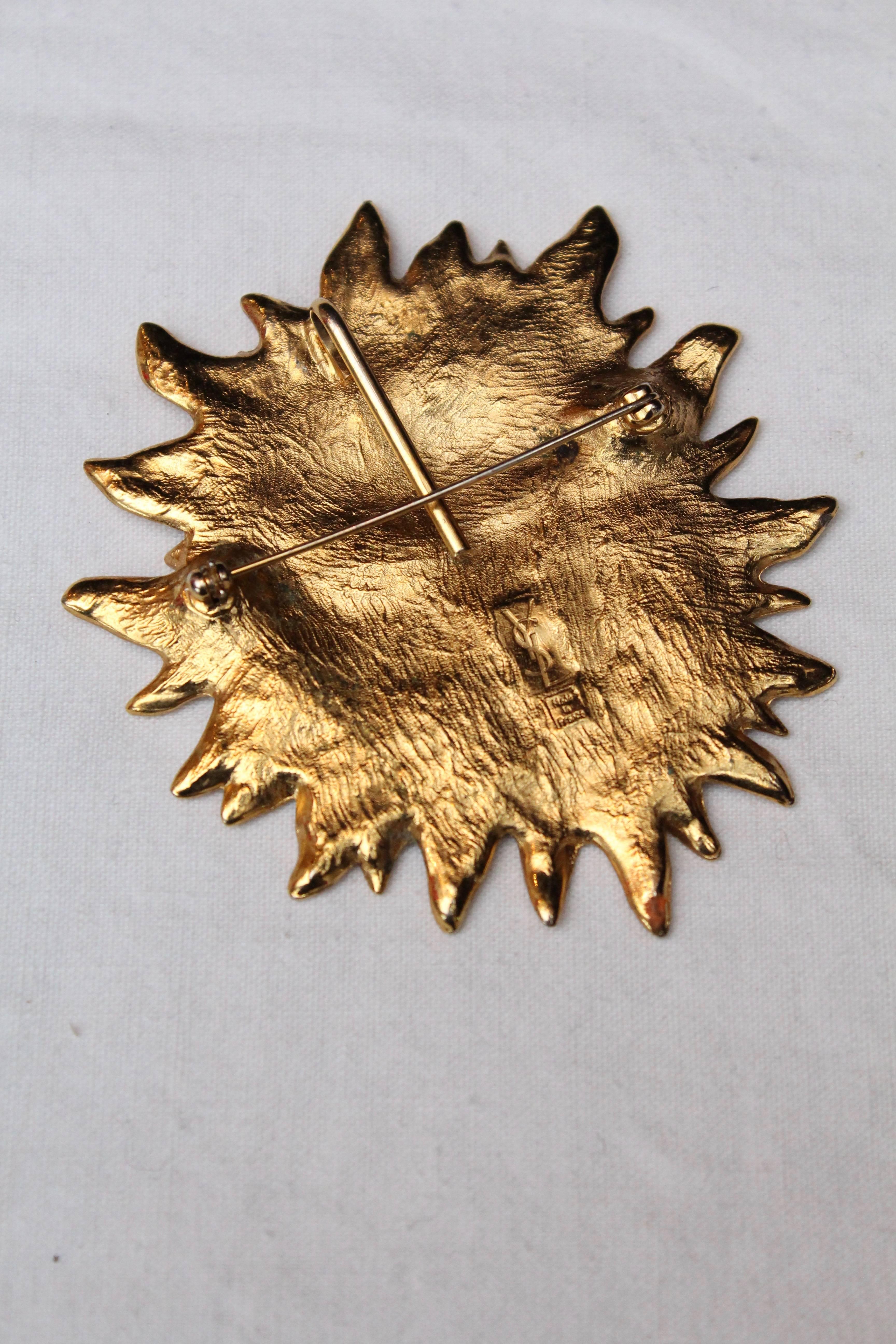 Yves Saint Laurent gilded metal sun-shaped brooch, 1980s  1