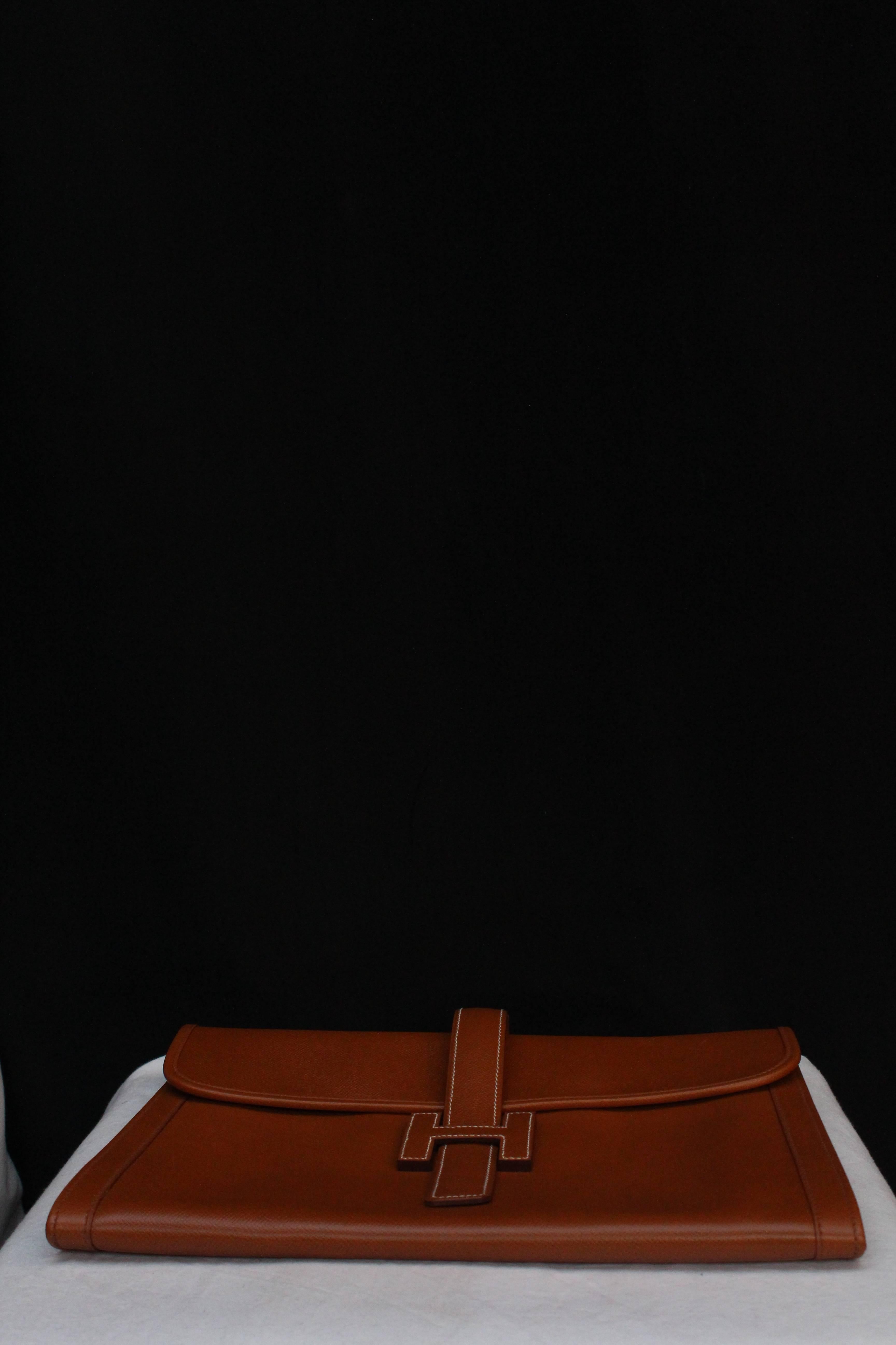 Women's or Men's Hermès “Jige” model clutch in tan togo leather