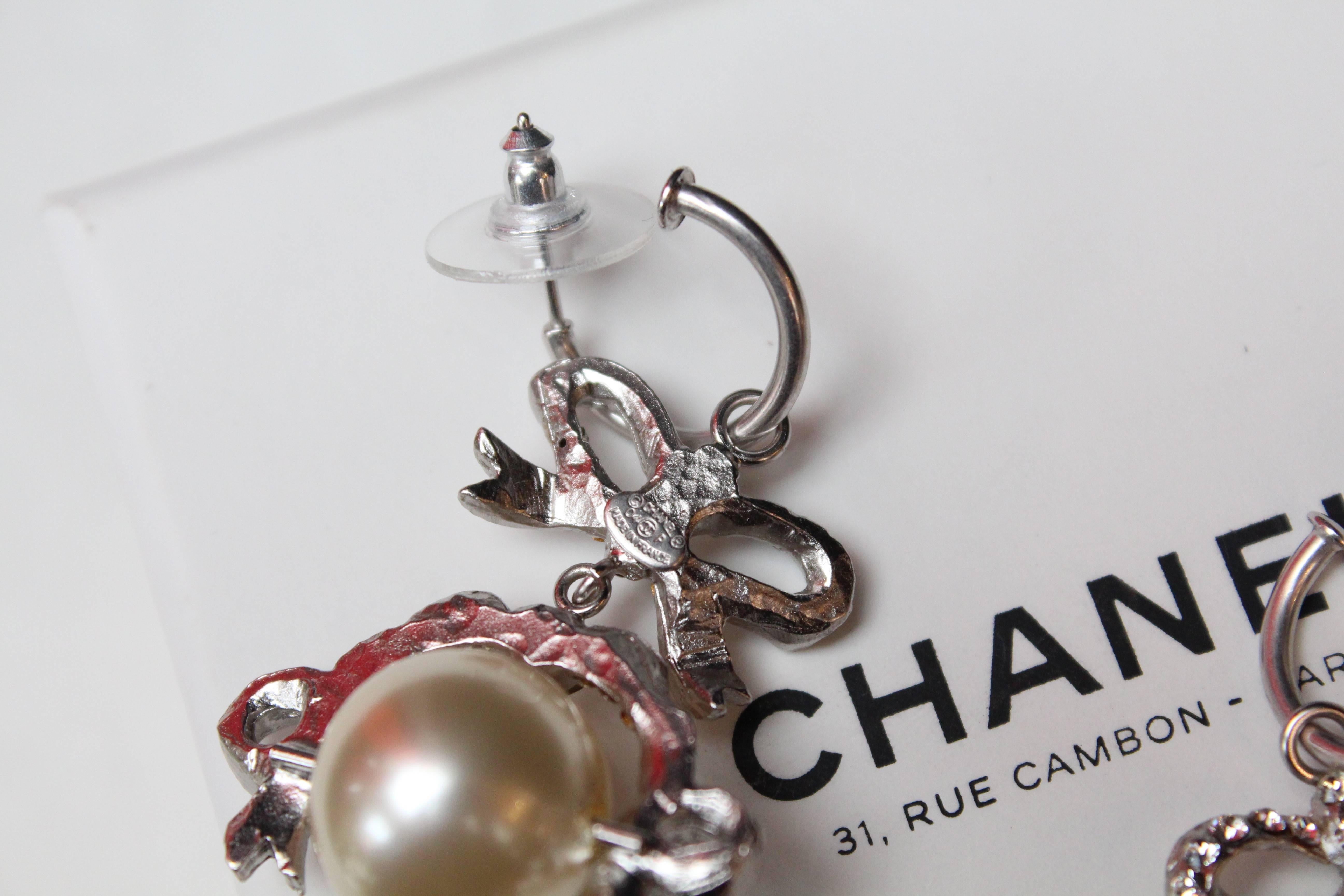 2004 Chanel gorgeous earrings representing a bow paved with rhinestones 1