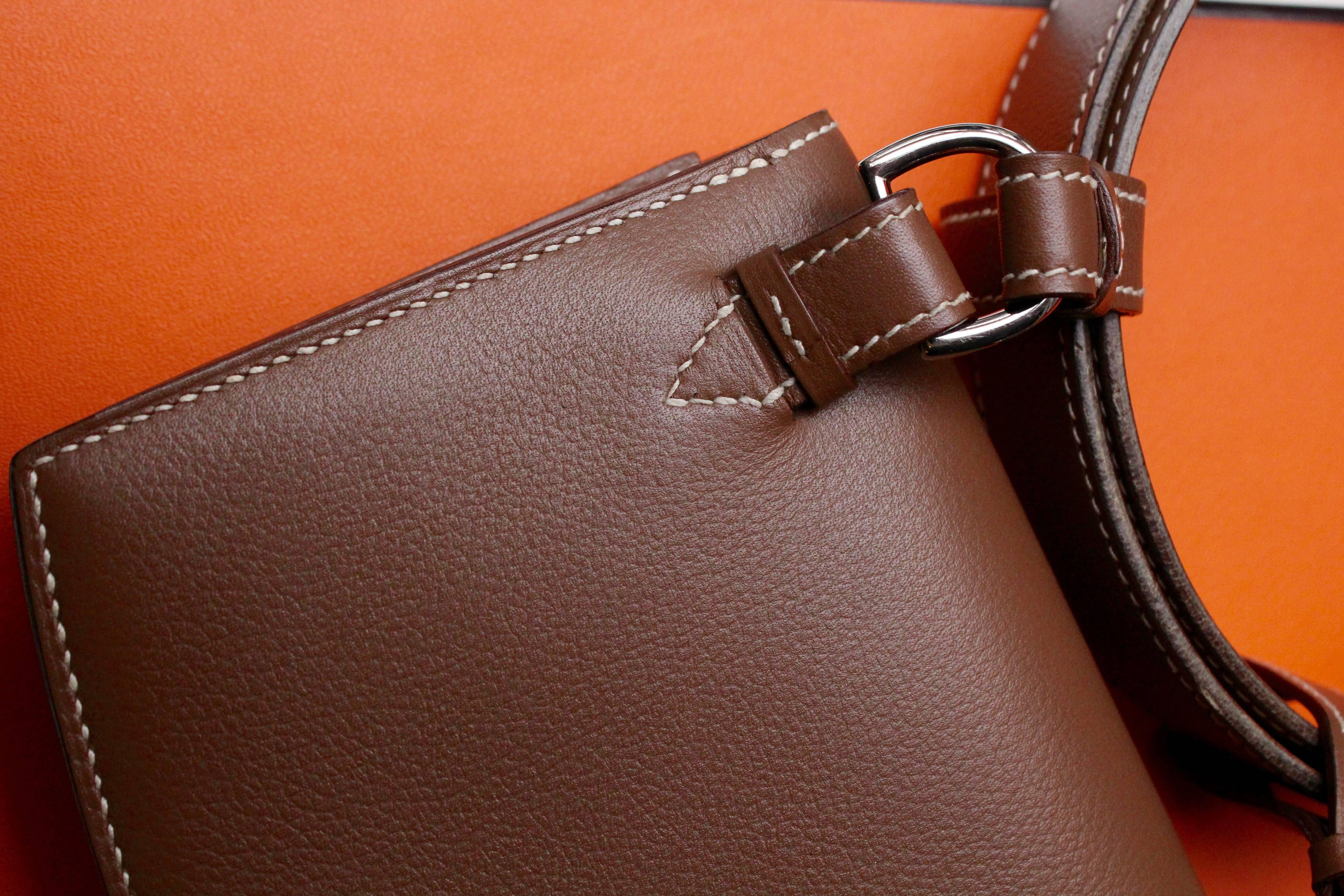 Hermès brown leather belt and clutch 1