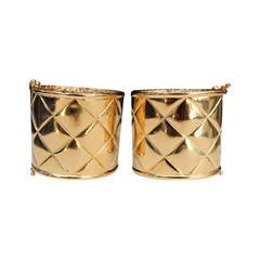 Pair of Quilted Gold Metal Cuff by Chanel, 1990s