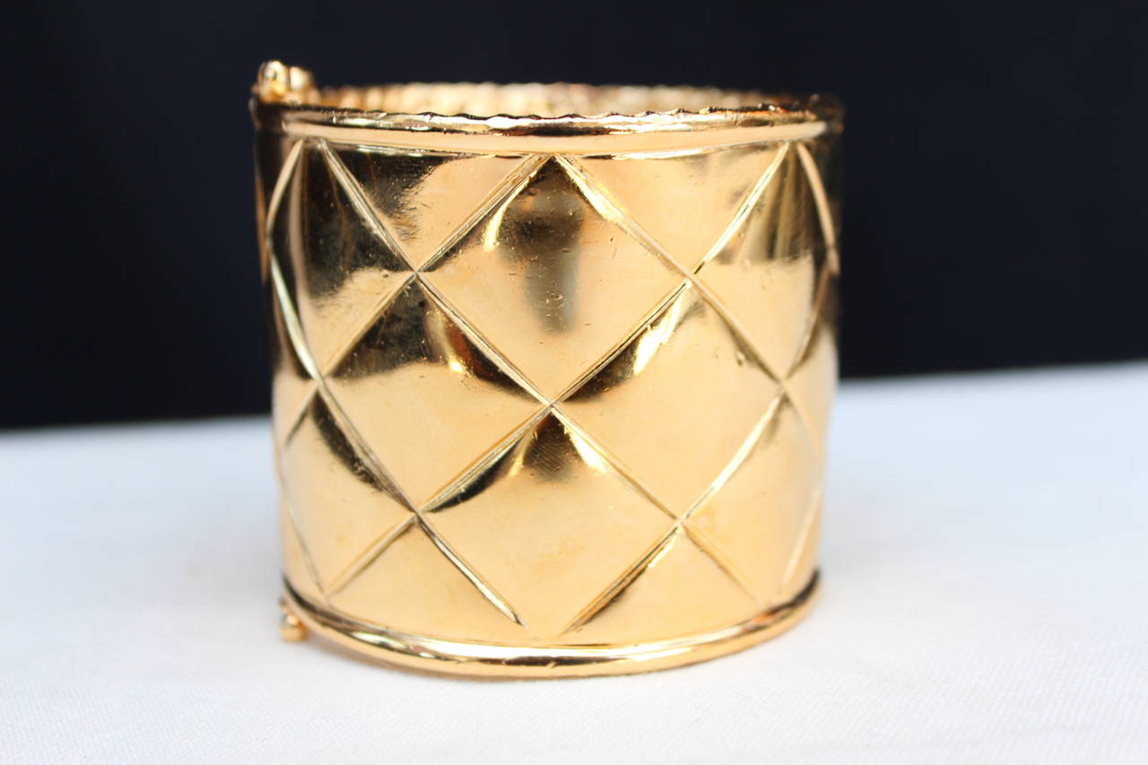 Pair of Quilted Gold Metal Cuff by Chanel, 1990s 4