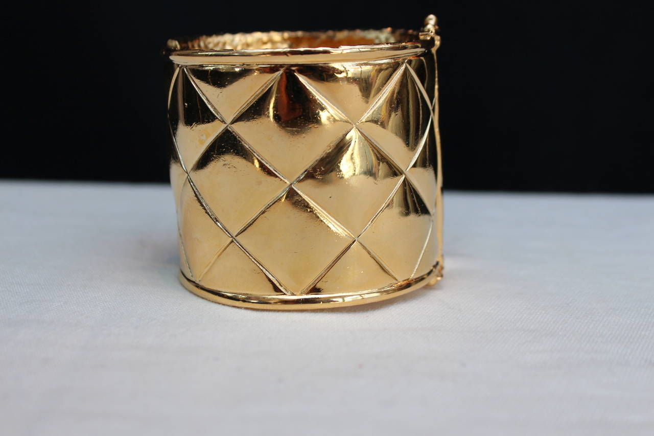 Women's Pair of Quilted Gold Metal Cuff by Chanel, 1990s