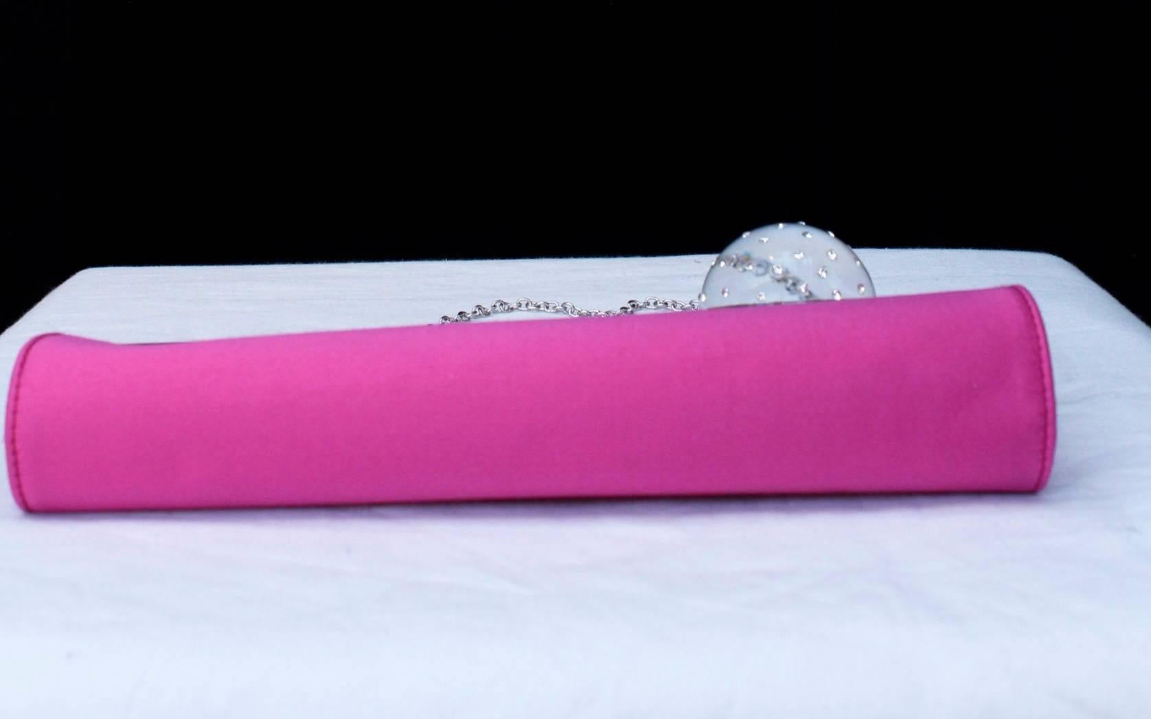 Charles Jourdan evening clutch made of fuchsia satin and transparent sphere 1