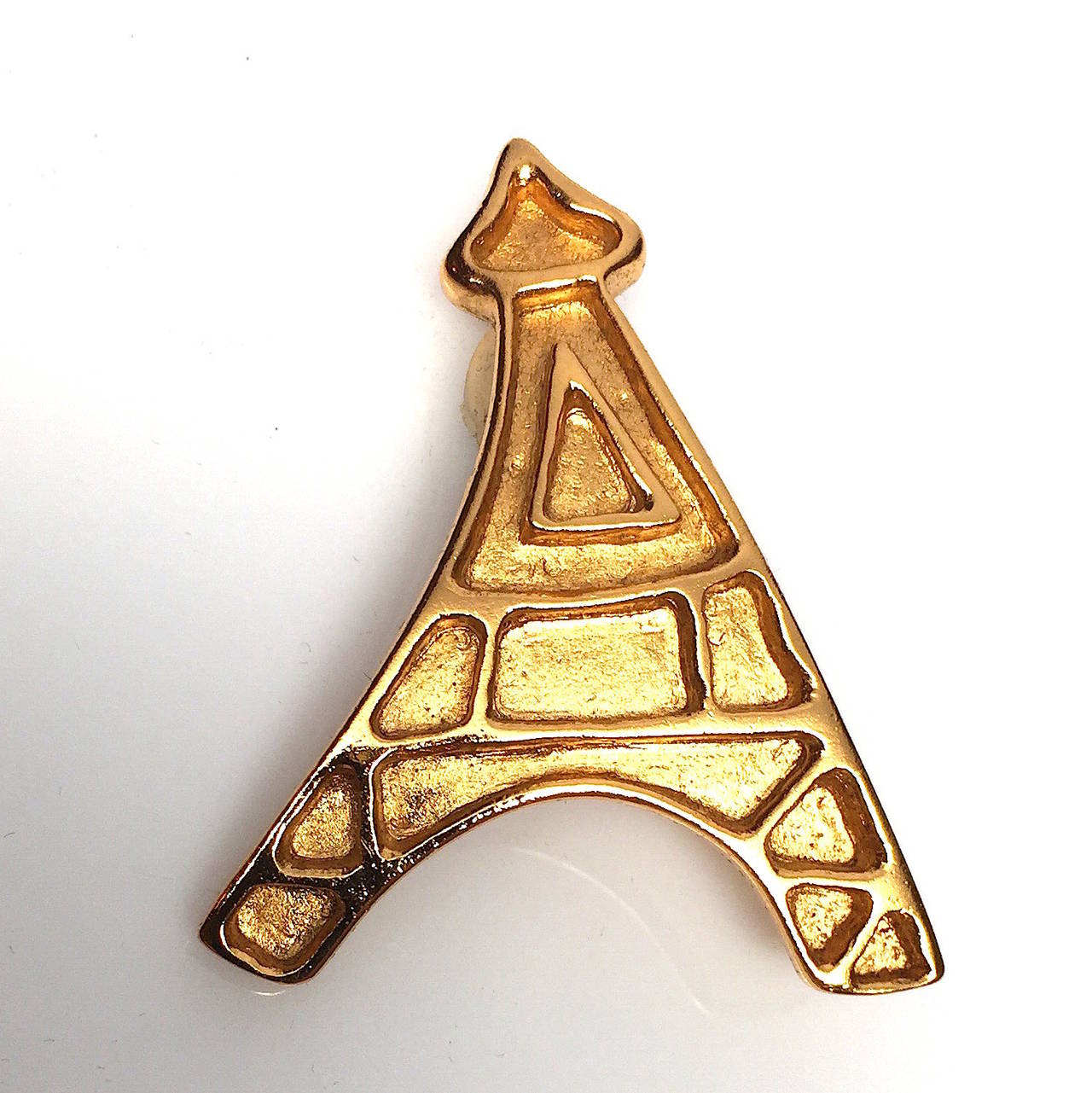 Art deco Yves Saint Laurent YSL gold-tone Eiffel Tower clip on earrings, circa mid-1980s. These were purchased in Paris at 