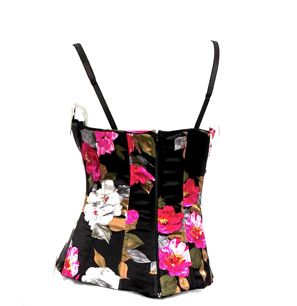 Black Dolce & Gabbana silk bustier top with fuchsia floral print, boning at lining, adjustable straps, and zip closure at center back.
Measurements: Bust 32”, Waist 30”, Length 20.5”