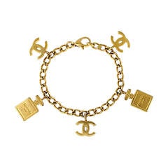 Chanel Gold Metal CC and Chanel No.5 Perfume Charm Bracelet at 1stDibs