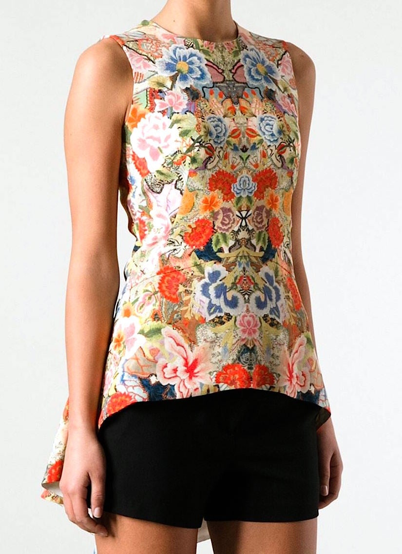 Multicolored silk blend sleeveless floral patchwork top by Sarah Burton for Alexander McQueen featuring a round neck, a concealed rear zip fastening and a pleated rear hem. The hem is longer at the back than at the front. From the Pre Spring Summer