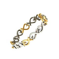 Tiffany & Co. Bracelet Paloma Picasso Loving Heart en or 18 carats et argent sterling