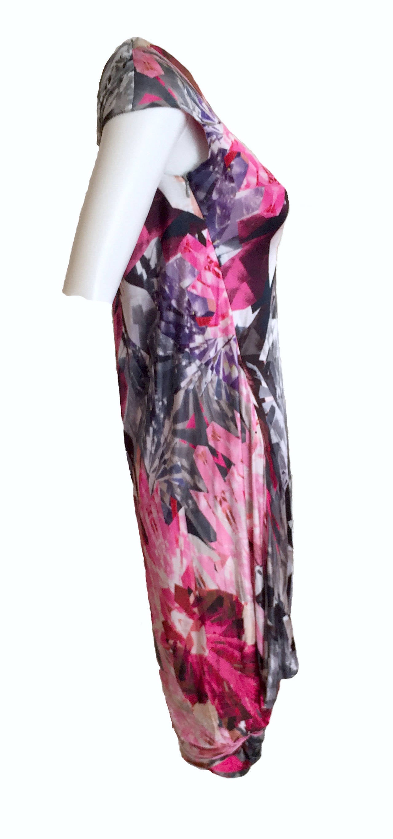 Rare, iconic Alexander McQueen runway pink and black kaleidoscope print dress from the 2009 Spring Summer Collection Natural Dis-Tinction Un-Natural Selection. Dress has short cap sleeves and a round neckline. Zips at shoulder and side. Ruched at