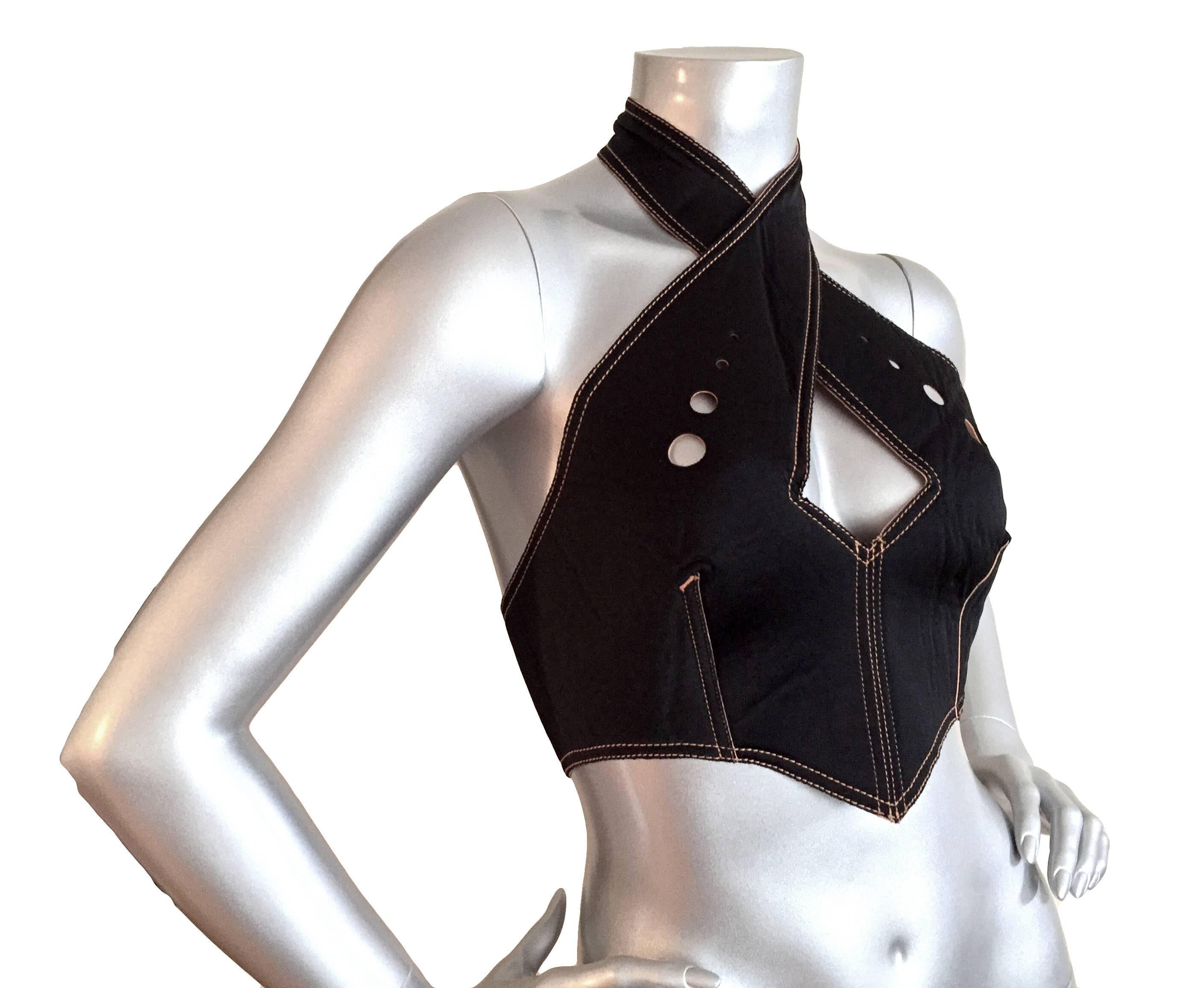 Knockout Jean Paul Gaultier neoprene halter top featuring circle cut outs and velcro closures at back of neck and lower back. Has stretch.