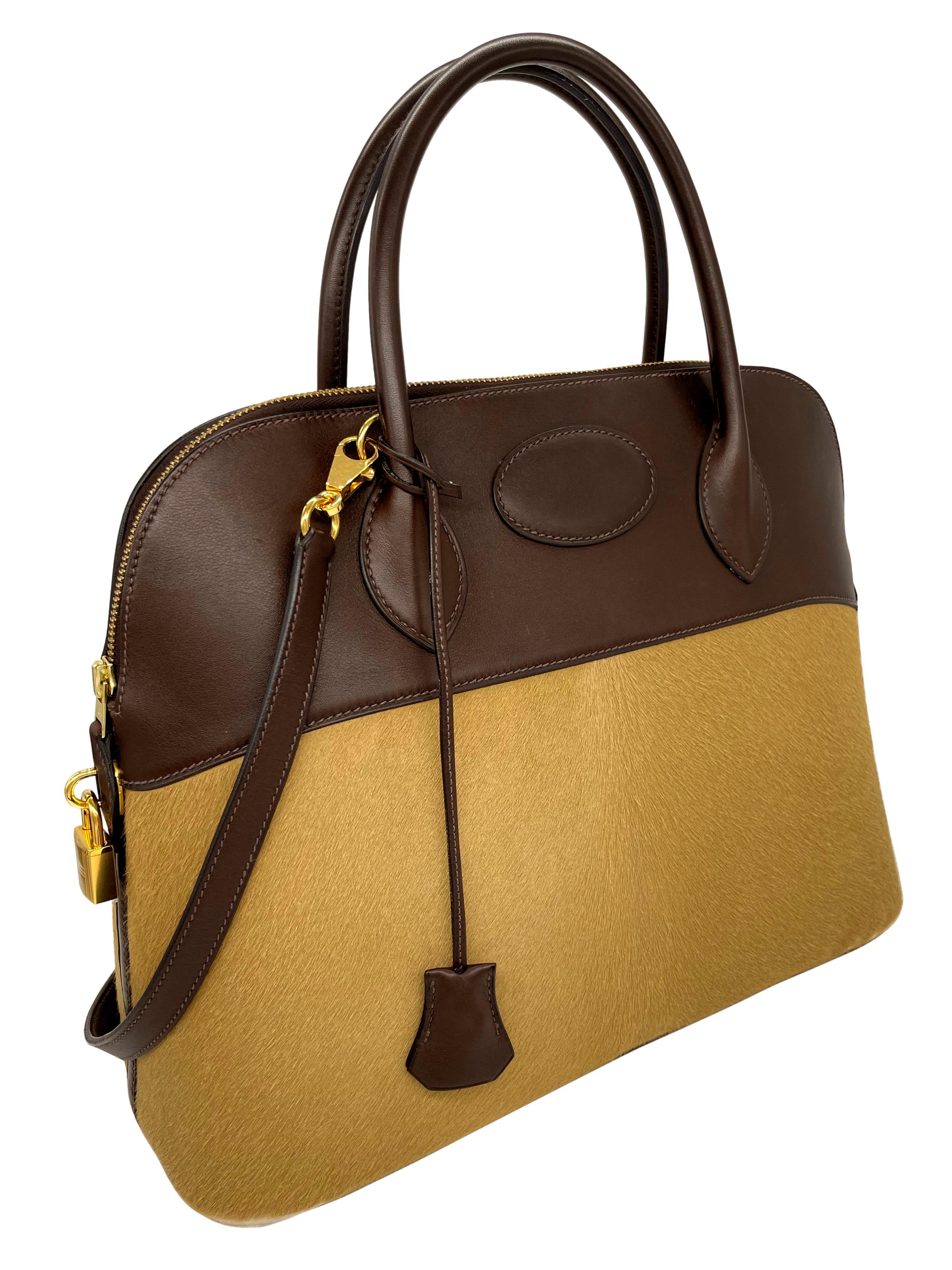 Hermés Limited Edition Ebene Evercalf & Troika Ponyhair Bolide Bag 35cm with Gold Hardware, 2007. Originally introduced in the Early 20th Century, the 