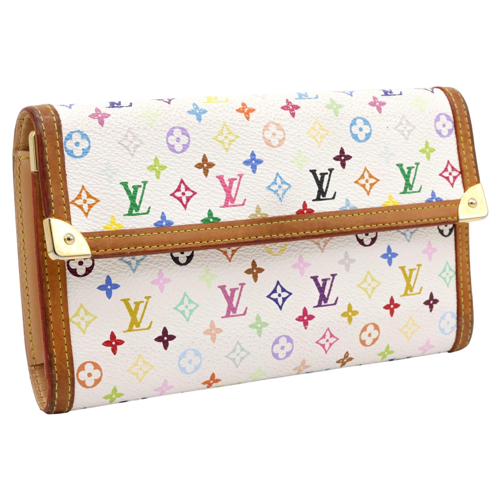 Louis Vuitton x Murakami Limited Edition Monogram Multicolor Porte Tresor Wallet, 2003. This highly sought after piece of Louis Vuitton history became a worldwide phenomenon when Japanese artist Takashi Murakami teamed up with the Louis Vuitton