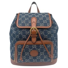 Gucci Denim GG Supreme Canvas and Brown Leather Backpack, Spring/Summer 2022.
