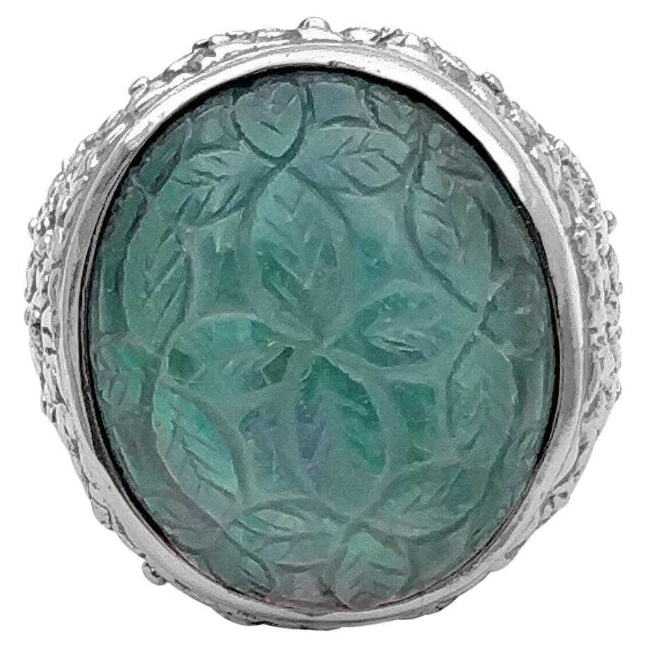 Carved Oval Rock Crystal over an Aqua Mother of Pearl Cocktail Ring For Sale