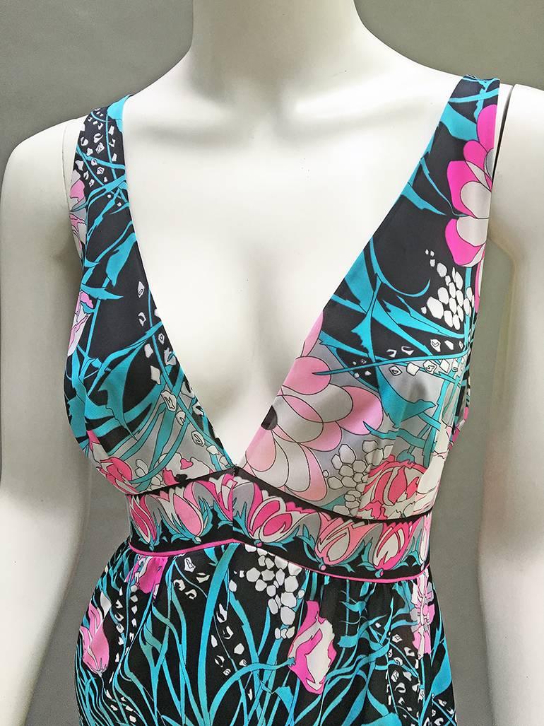 In our Vintage loving opinion  this is the most gorgeous pucci print there ever was- 
Pucci perfection . . . The sexy, deep-vee skimpy cut . . . The amazing noir botanical graphic of pale and darker pink tulips and aqua grasses with white accents
