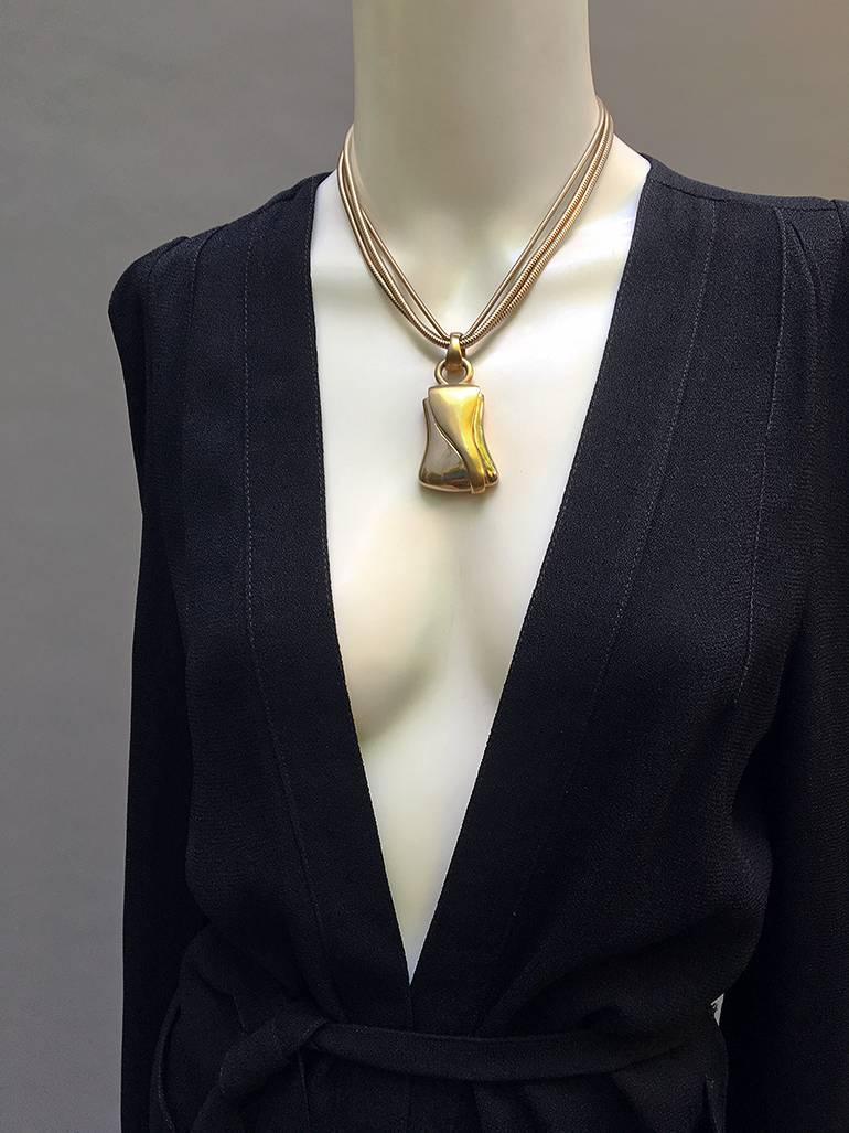 80s- early 90s Givenchy Vintage Triple Chain & Pendant Necklace- super quality - nice heavy weight. - the triple chain is just fabulous

Chain Length 15 to 18 with the adjustable chain and clasp
pendant has the most fantastic oversized look
and