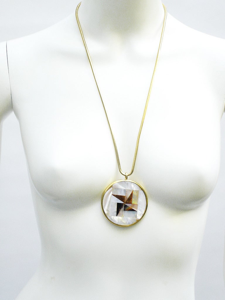 Super gorgeous 1977 Givenchy Vintage Snake Chain & Pendant Necklace-
Fantastic oversized pendant is Mother of Pearl in intricately inlaid with the motif of a Star. Best quality -
Nice heavy weight
Stamped GIVENCHY 1977 on the back

LABEL