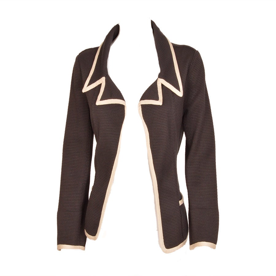Mademoiselle CHANEL said: “The Ultimate in Luxury is Comfort”.  This unstructured silhouette in silk knit-like weave is unlined and ultra comfortable.   The jacket may be worn closed and tied with the matching bel,  or open with belt hanging on