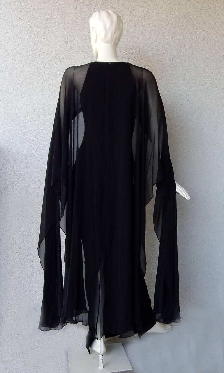 black gown with cape