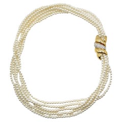 Collana "Torsade" con chiusura a onde decorative in oro placcato vintage e perle, anni '80