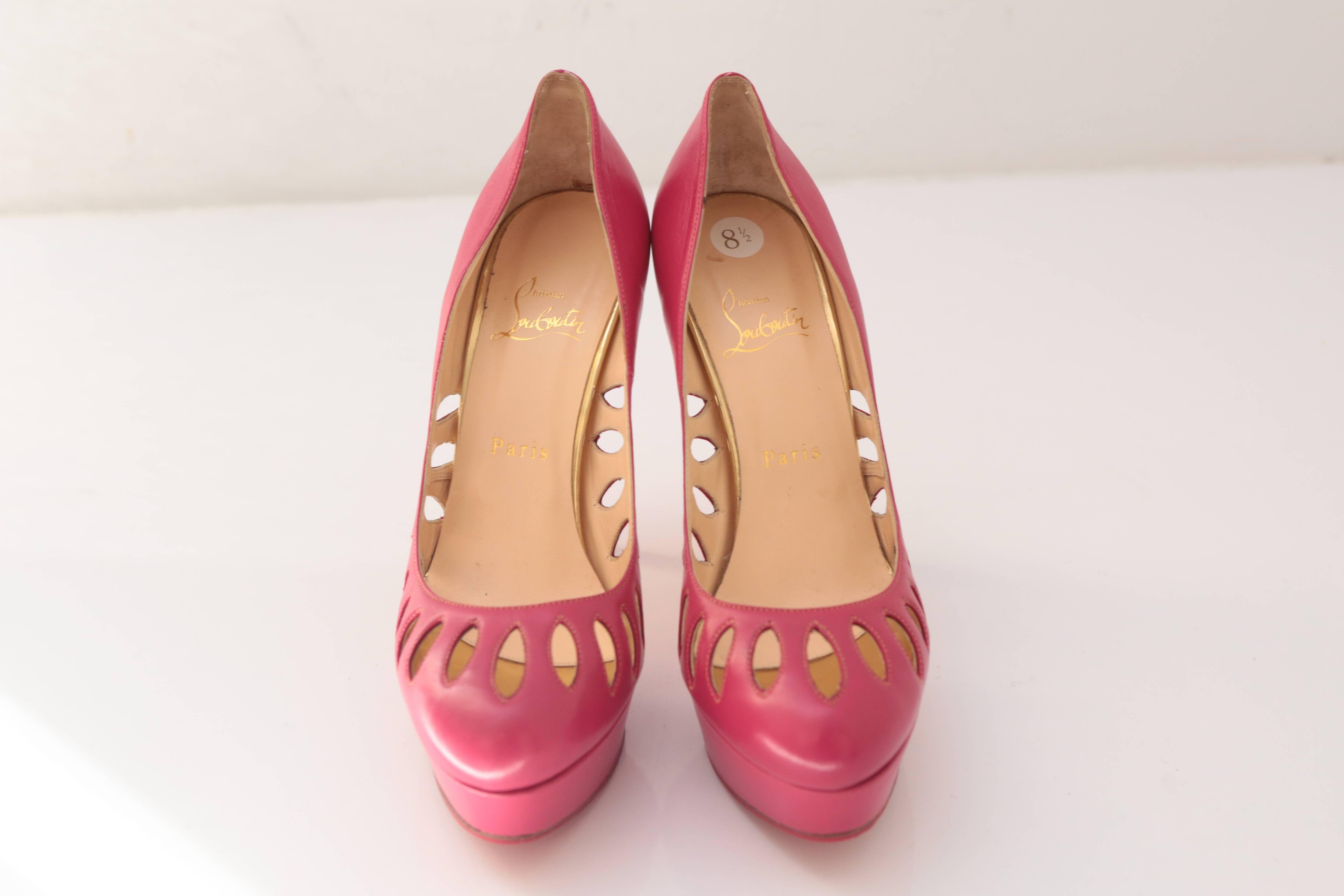 Christian Louboutin Pink Cutout Pumps In Excellent Condition In Bridgehampton, NY