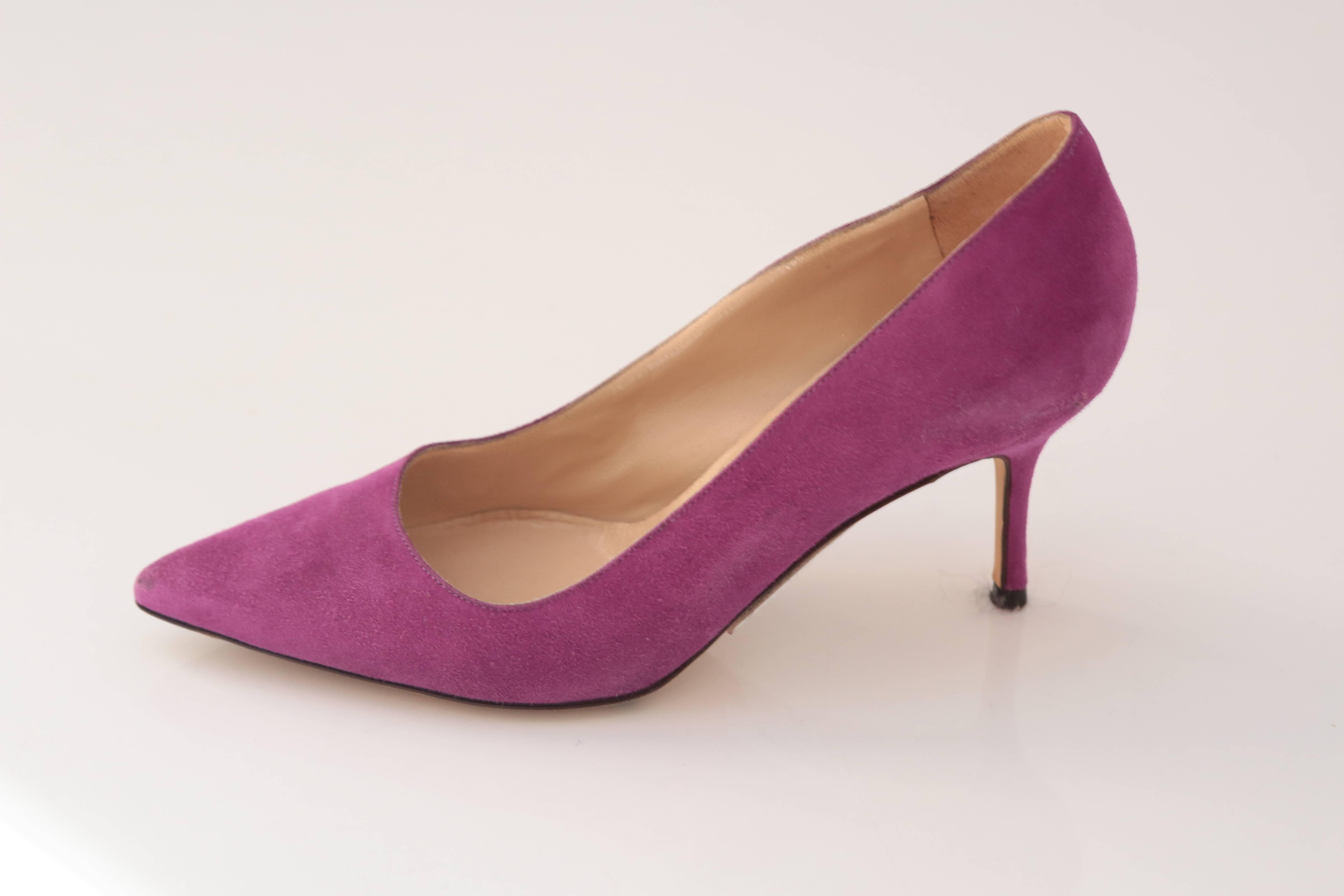 A staple Manolo Blahnik pump in Magenta Suede is a fun addition to any shoe lover's closet!