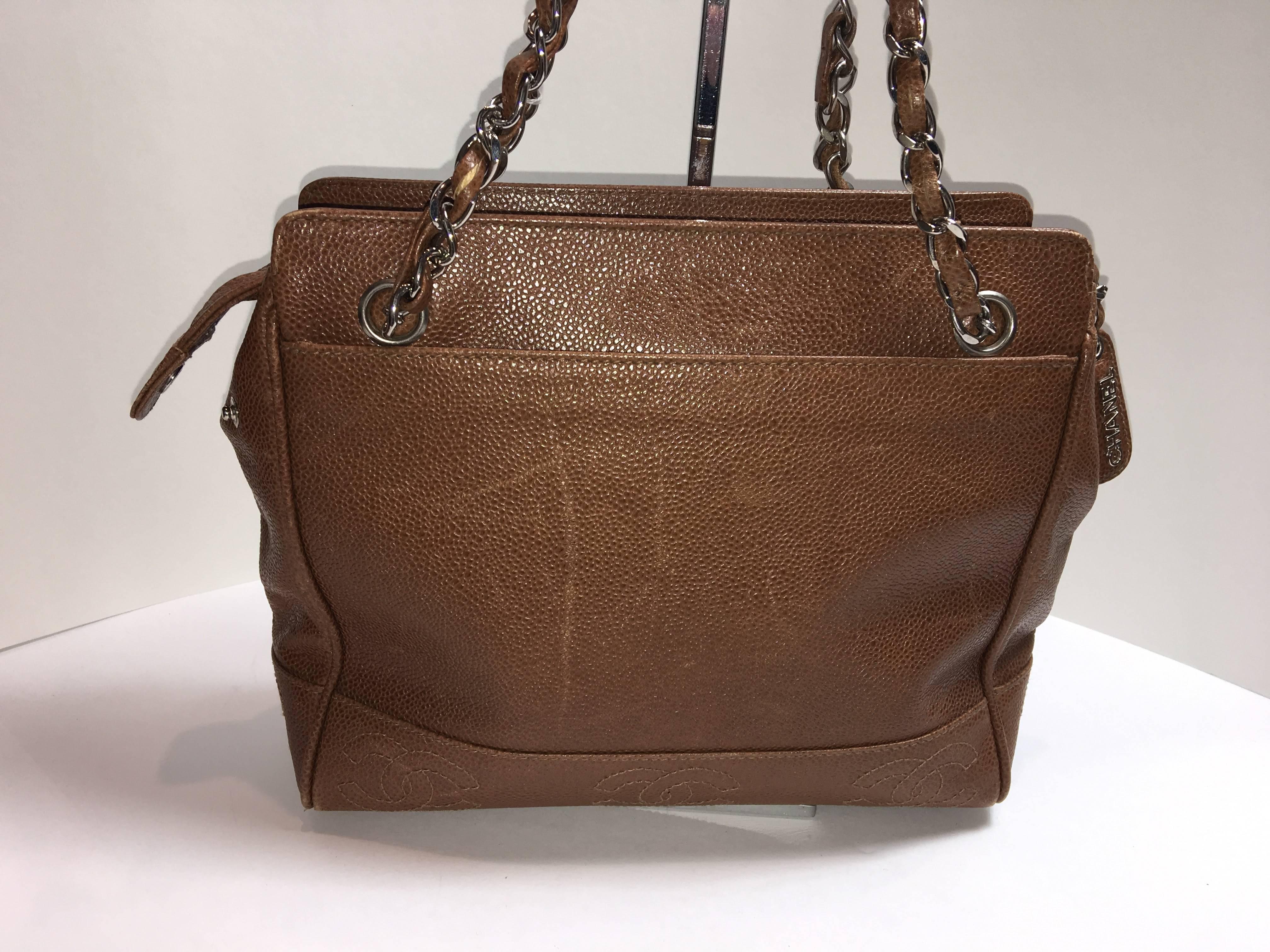 Vintage Chanel Camel Pebbled Leather Handbag. Double Strap tote with CCs at trim and gold hardware. 