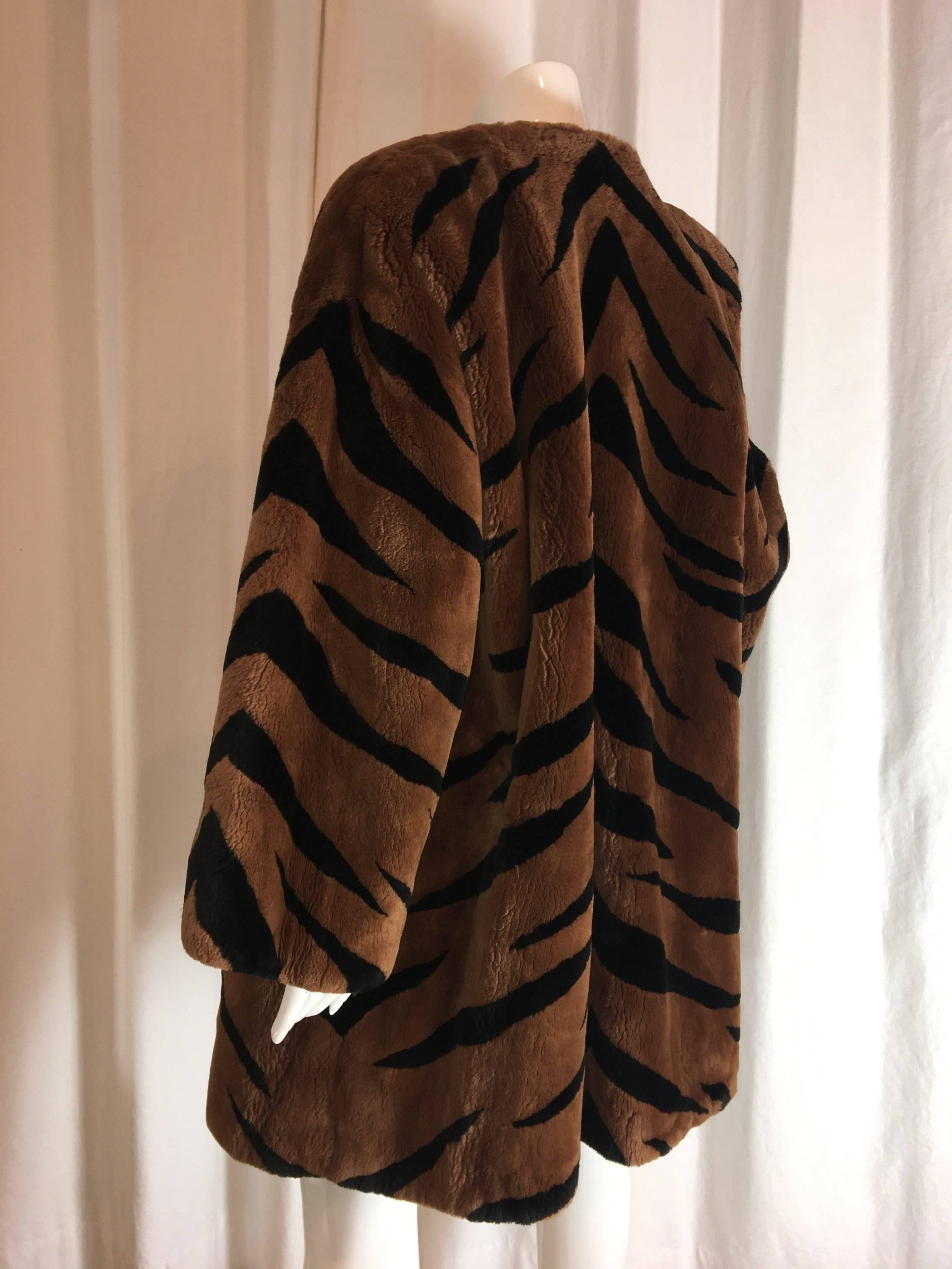 Alixaudre Tiger Print Fur Beaver Fur Coat. Mid length in brown and black.