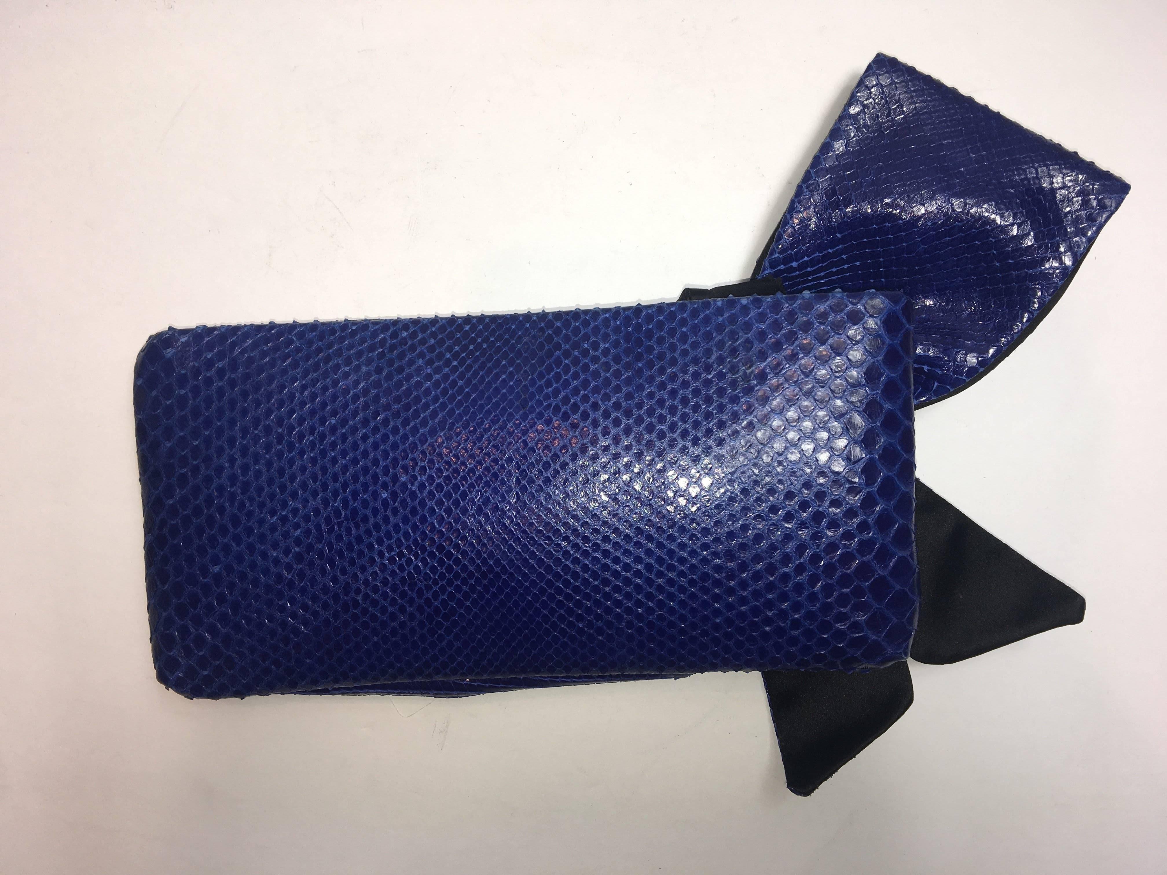 Valentino Royal Blue Python Clutch with Zip Top Bow Detail. 