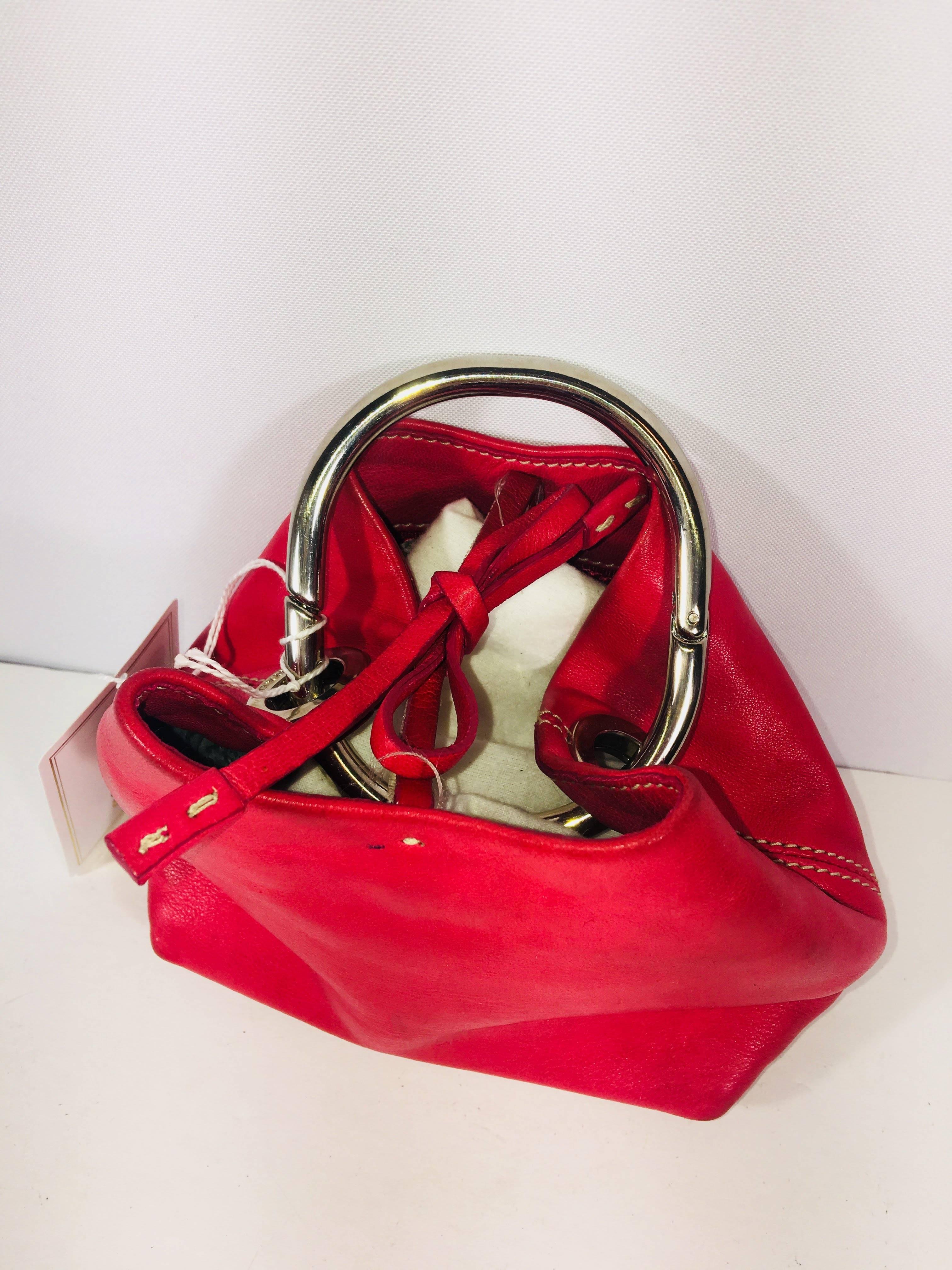 Prada Small Nappa Ring Mini Handle Bag in Fuchsia Leather. Silver Hardware. Inside Zip Pocket