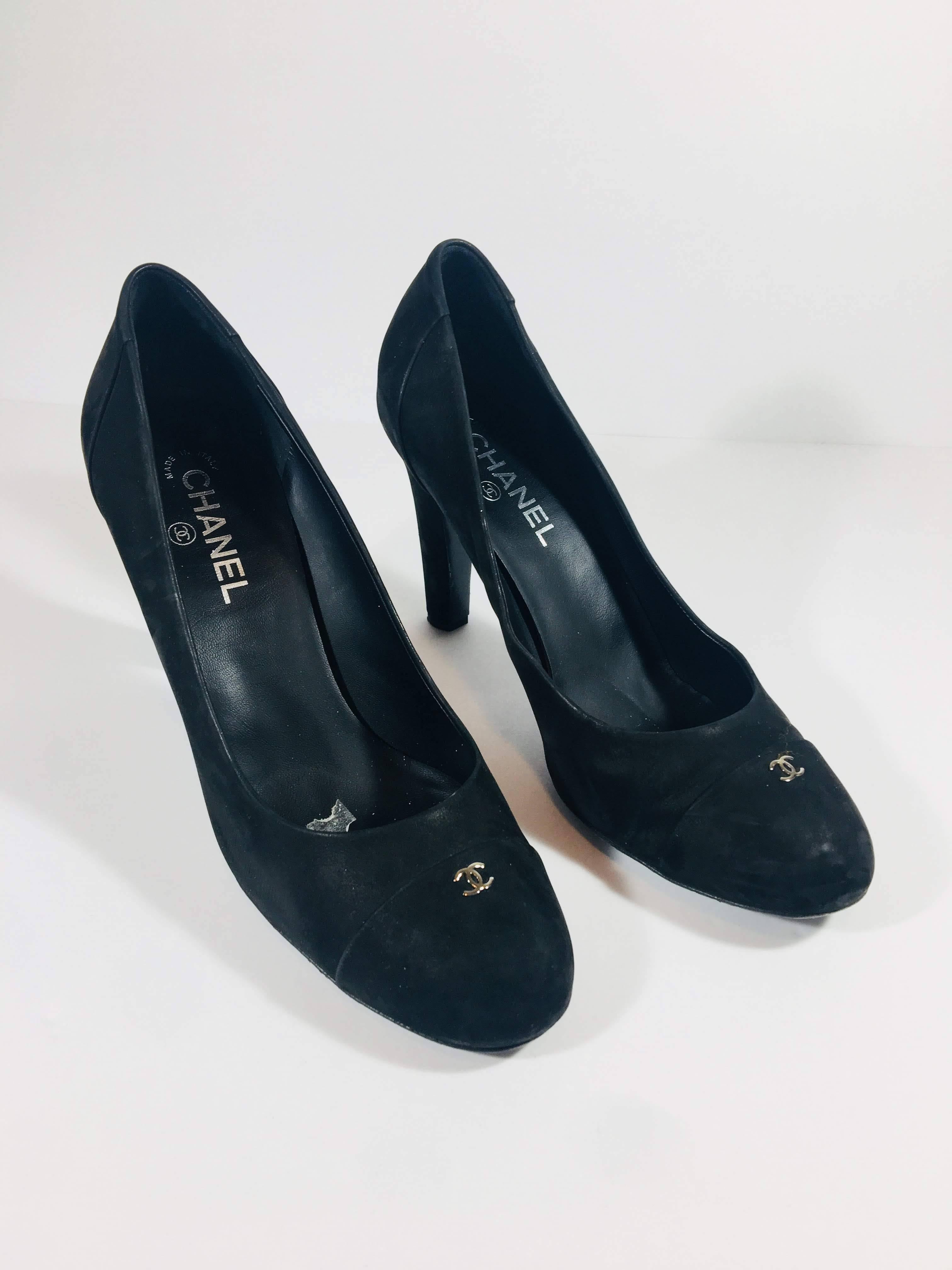 Chanel Black Suede Pumps with Rounded Toe and Silver CC Emblem at Toe and Thick Stiletto Heel. 
