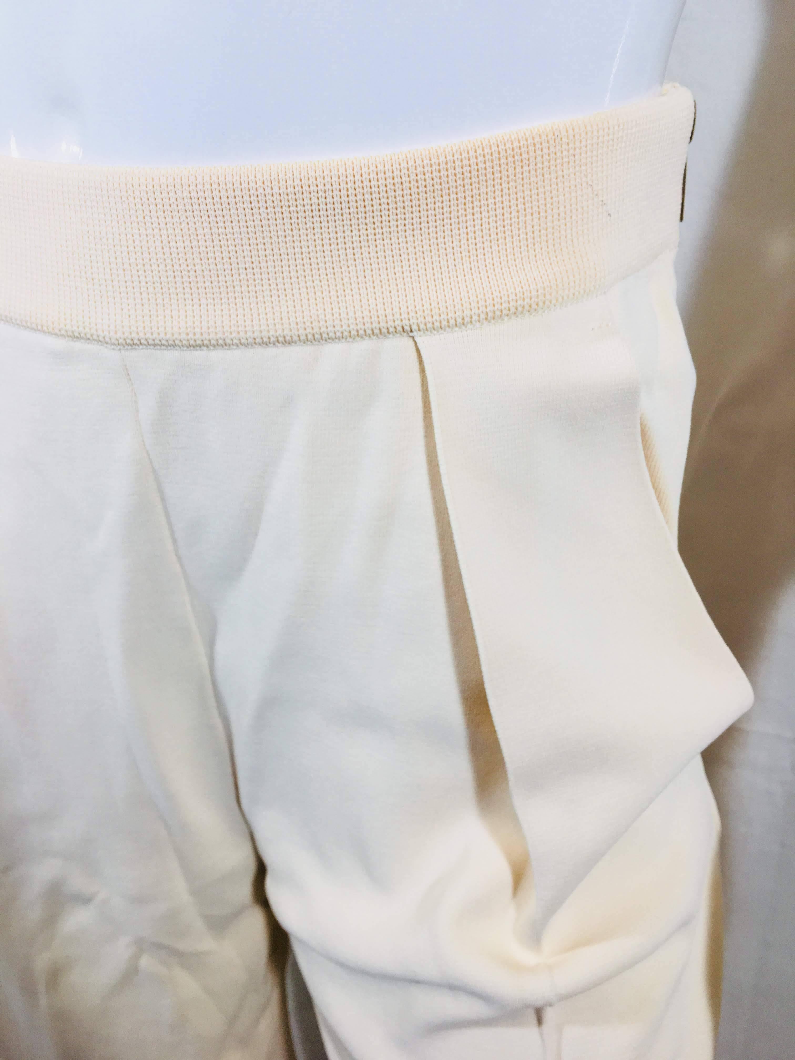 Sonia Rykiel High Rise, Straight Leg Pant with Side Zipper and Thick Waist Band in Cream.