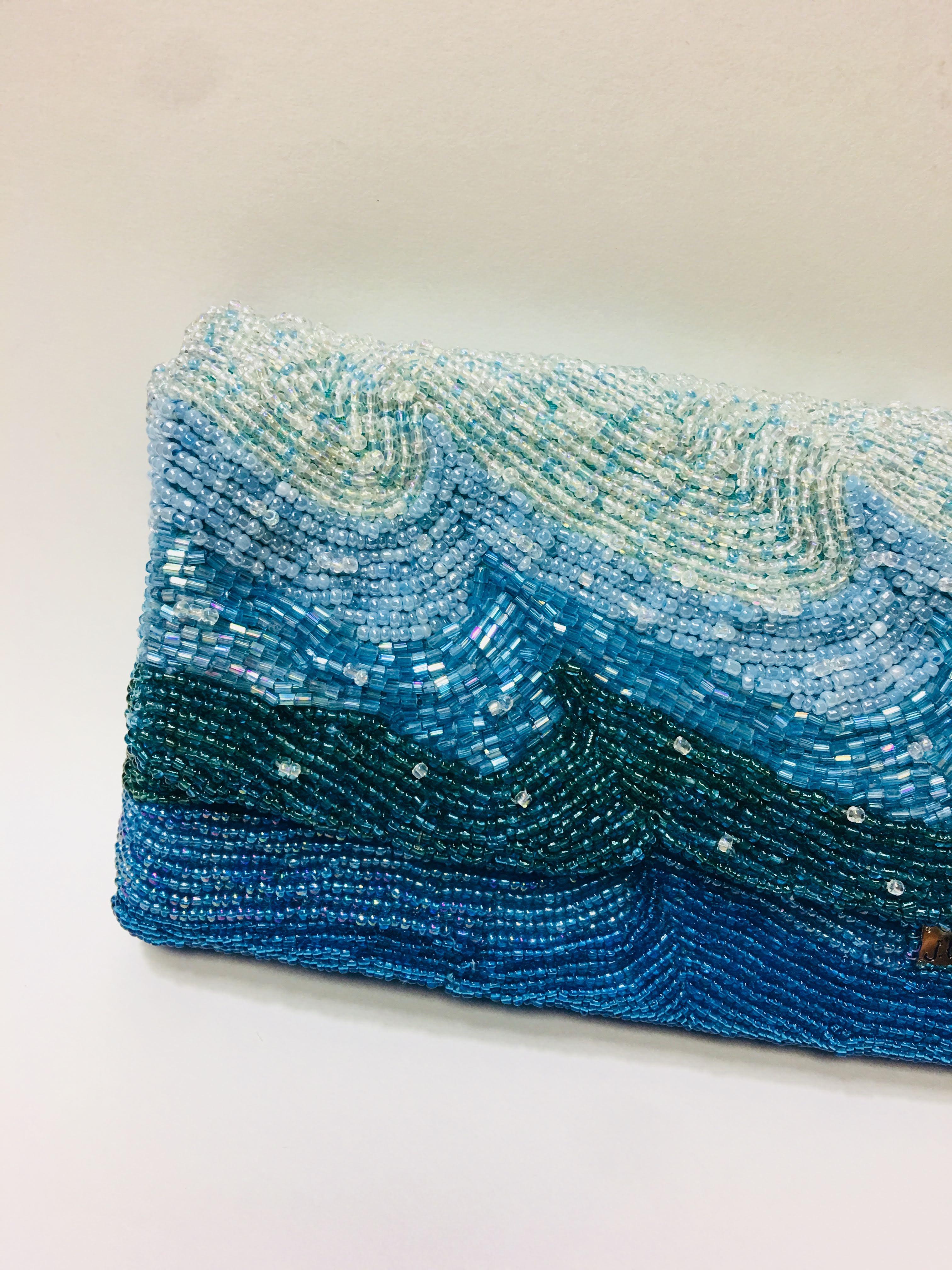J. Lhuiller Beaded Clutch with Magnetic Closure. Envelope Style With Multiple Shades of Blue Beads in a Wave Design.
