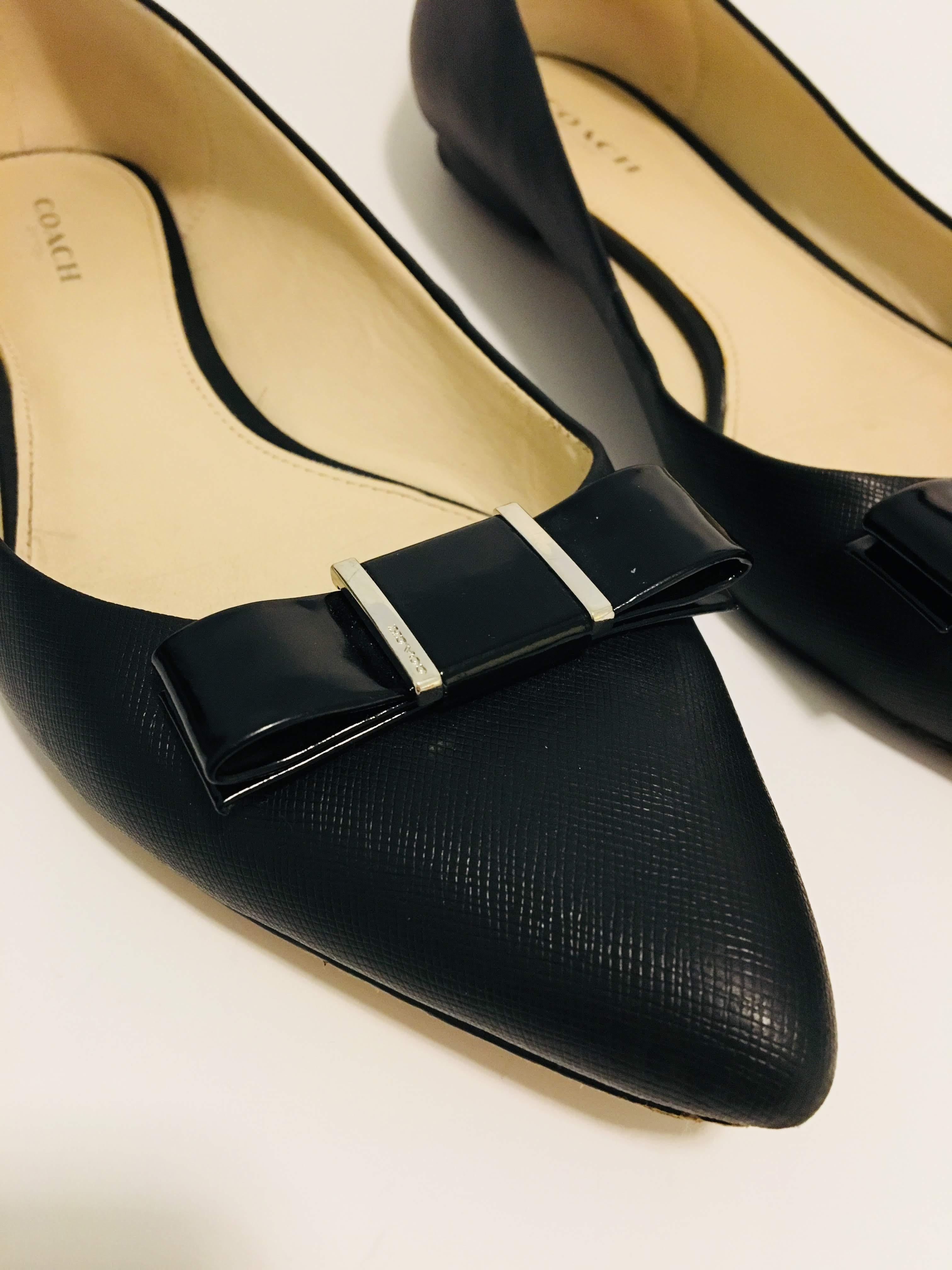 black coach flats