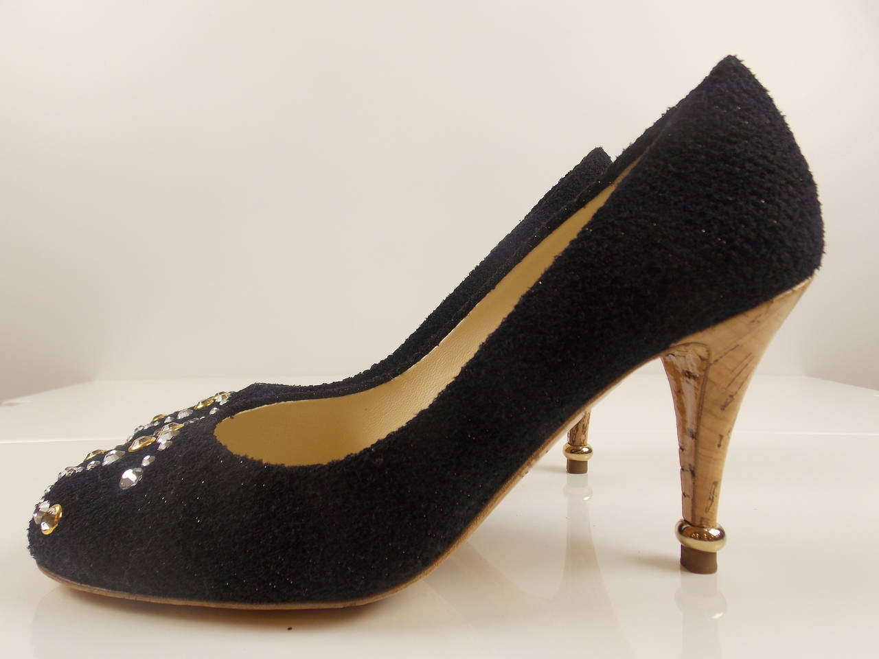 Sparkle tweed fabrication, lacquered cork heels and soles, gold ring detail above heel tap with crystal interlocking CC's.