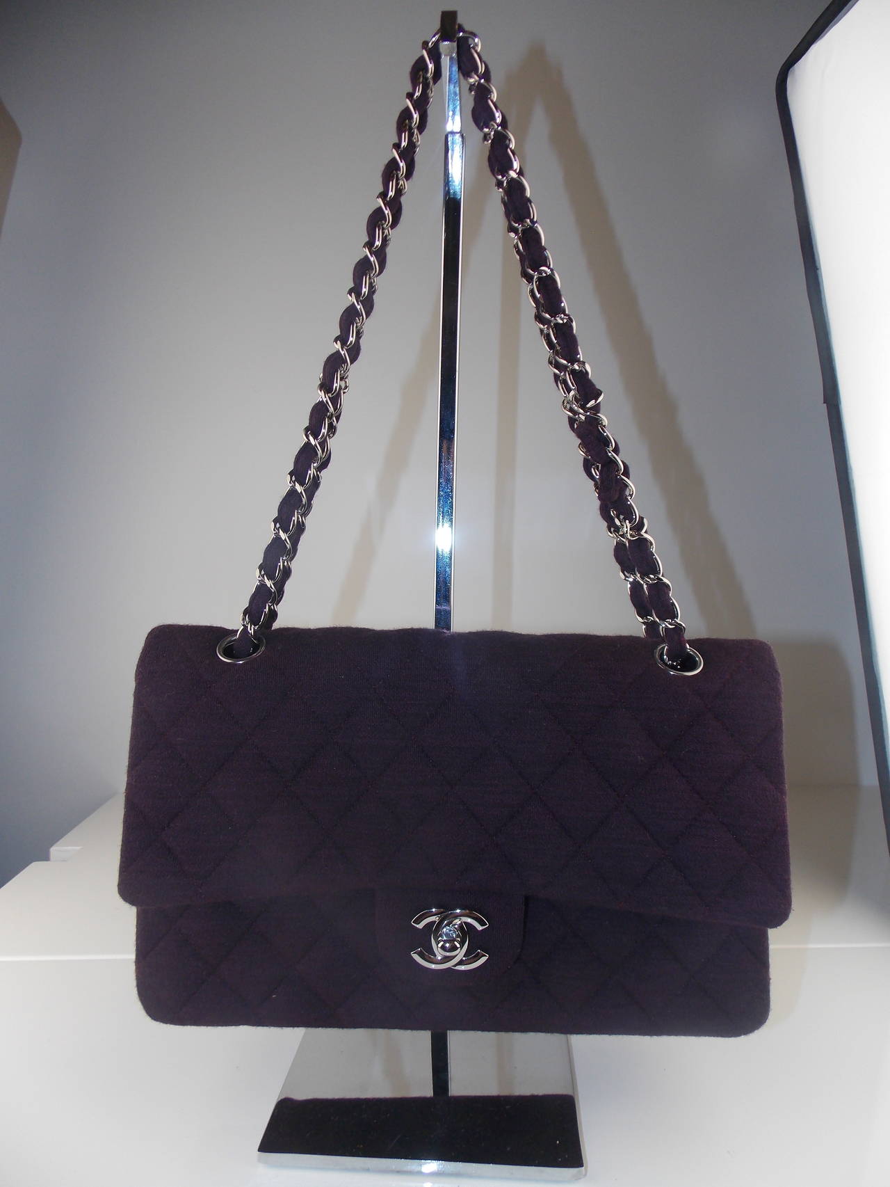 A must-have for any Chanel gal, is a wardrobe staple with its signature Chanel quilted material and antiquated pewter hardware.

This special edition quilted classic reissue flap from Chanel is featured in a soft wool-like-quilted canvas, which