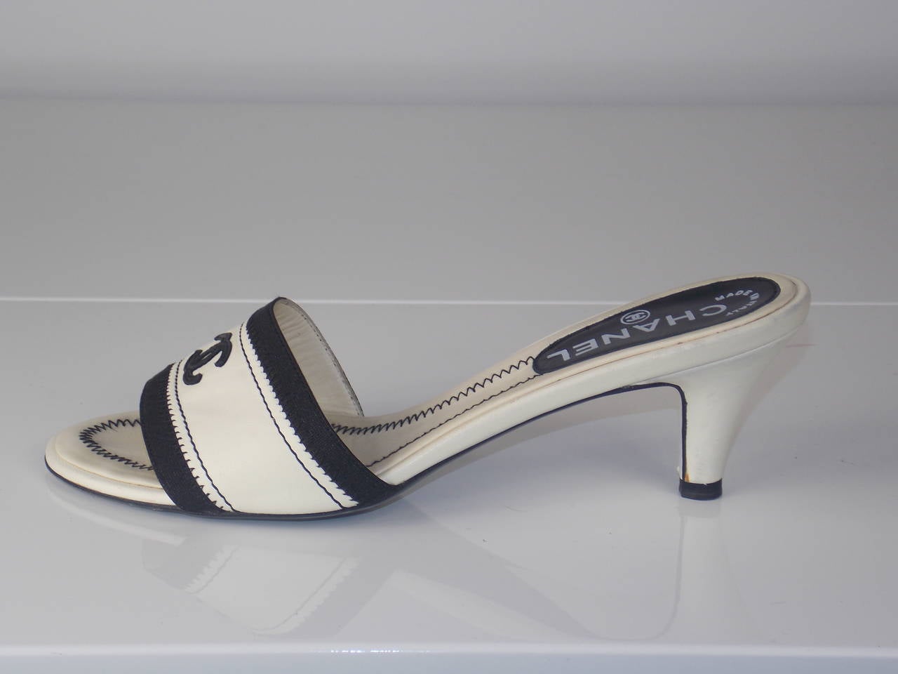 Women's Chanel Open Toe Cream Sandal With Black Stitching And CC Logo