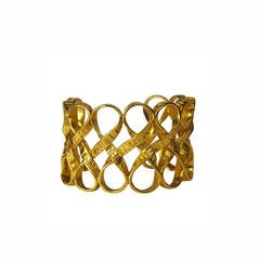 Chanel Gold Toned Ribbon Weave Cuff Bracelet