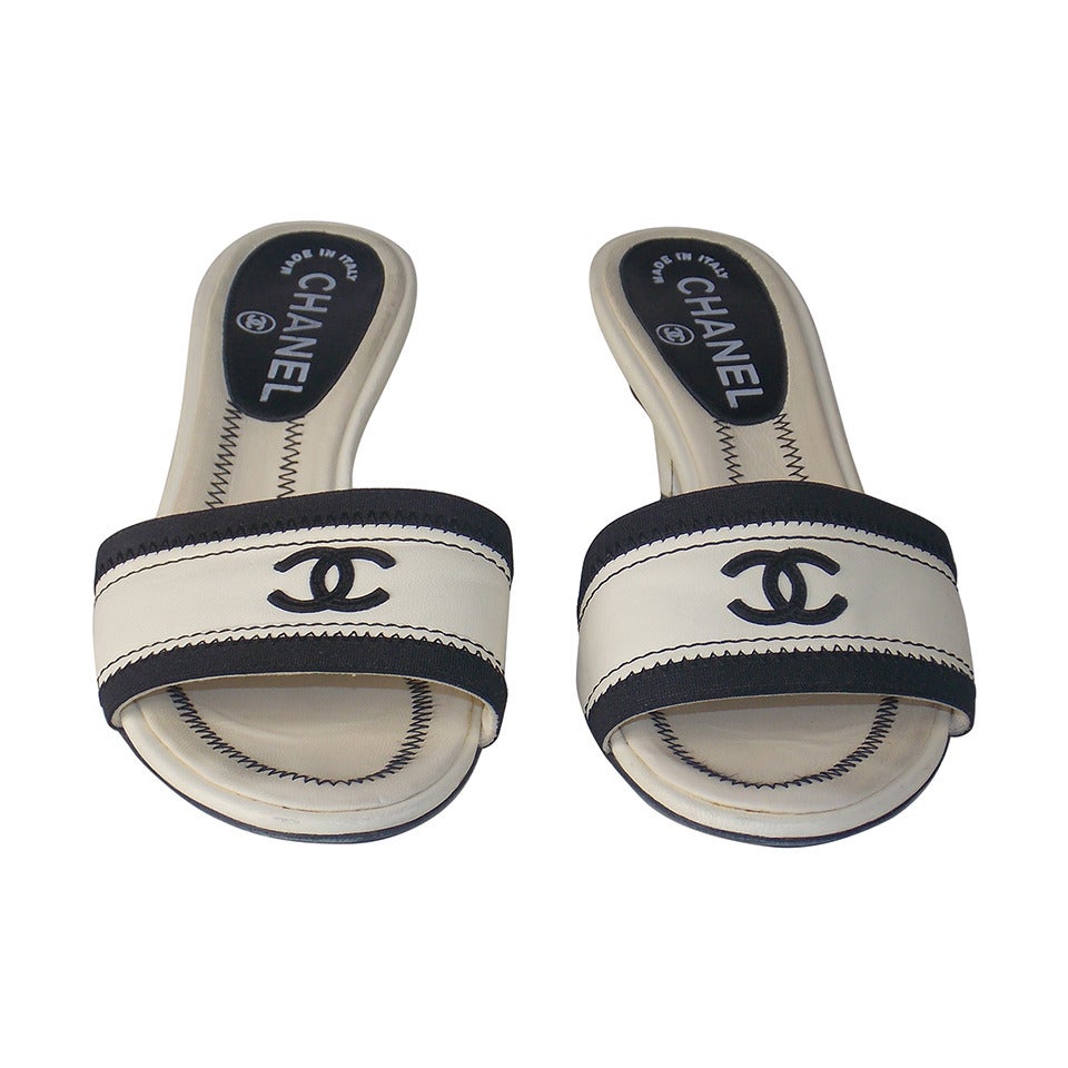 Chanel Open Toe Cream Sandal With Black Stitching And CC Logo