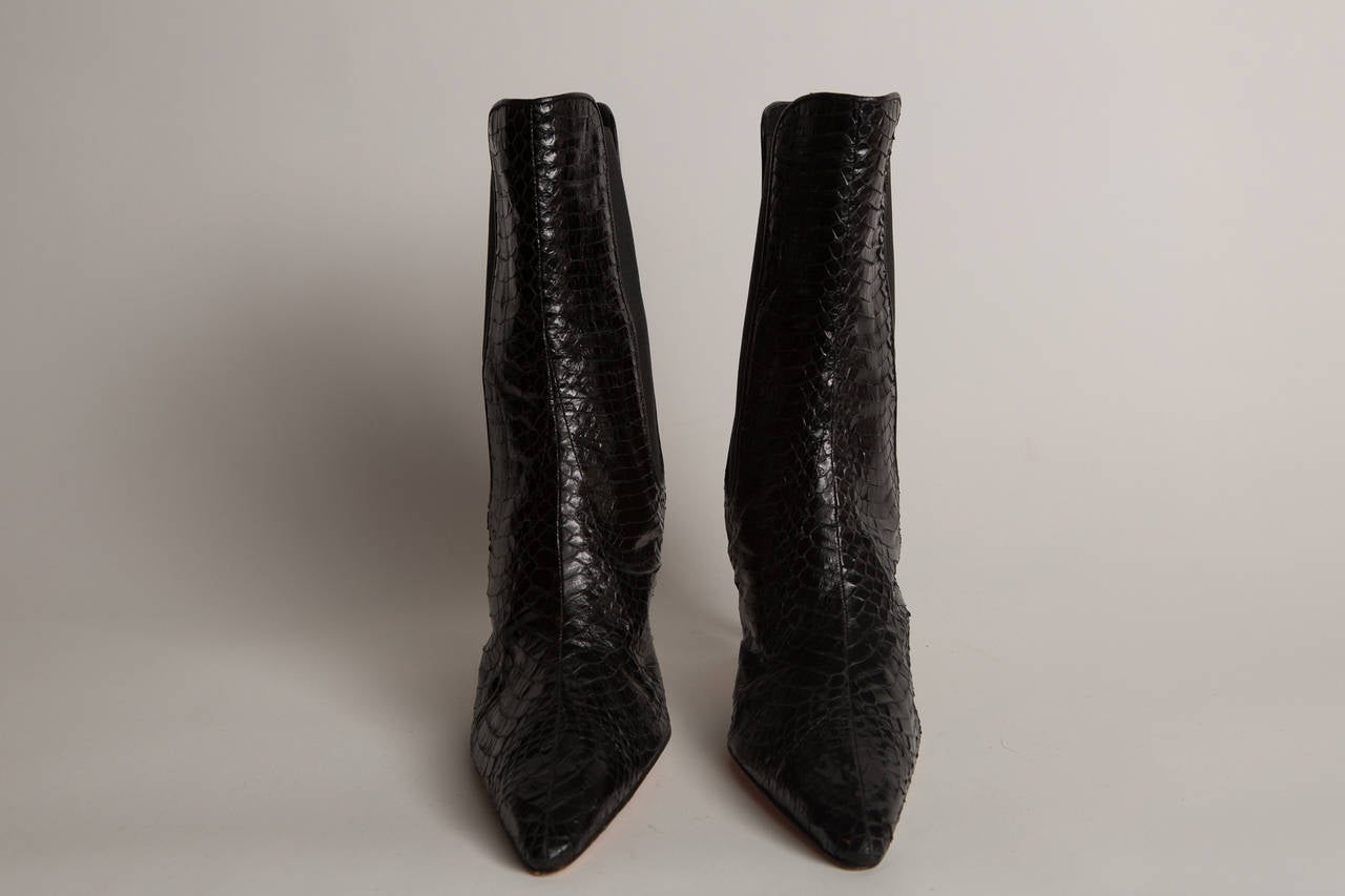 black booties with snakeskin heel