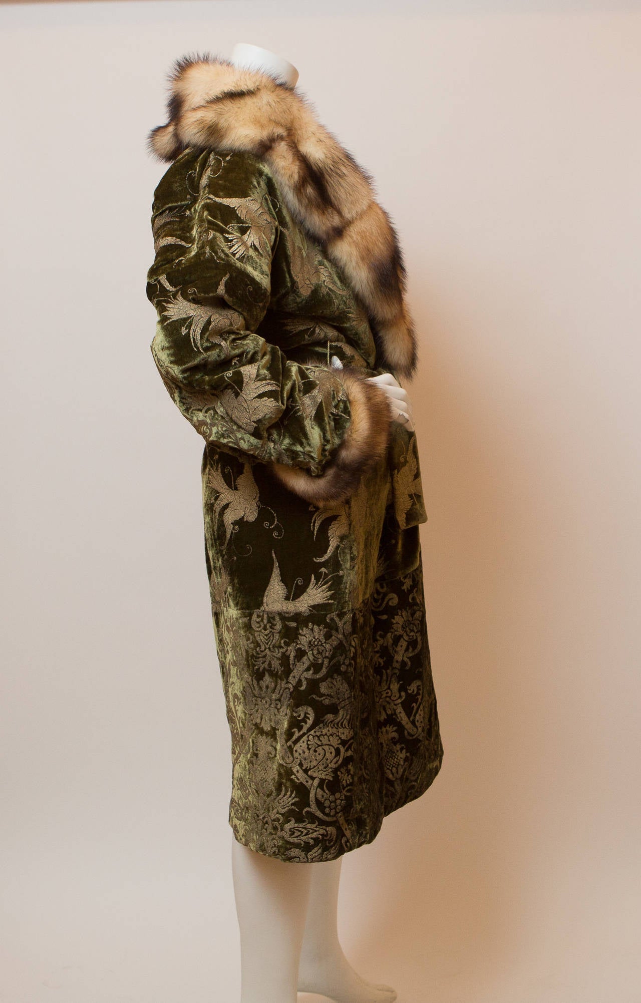 Roberto Cavalli, olive green, velour and brocade belted long coat, with fur collar, and silk lining.